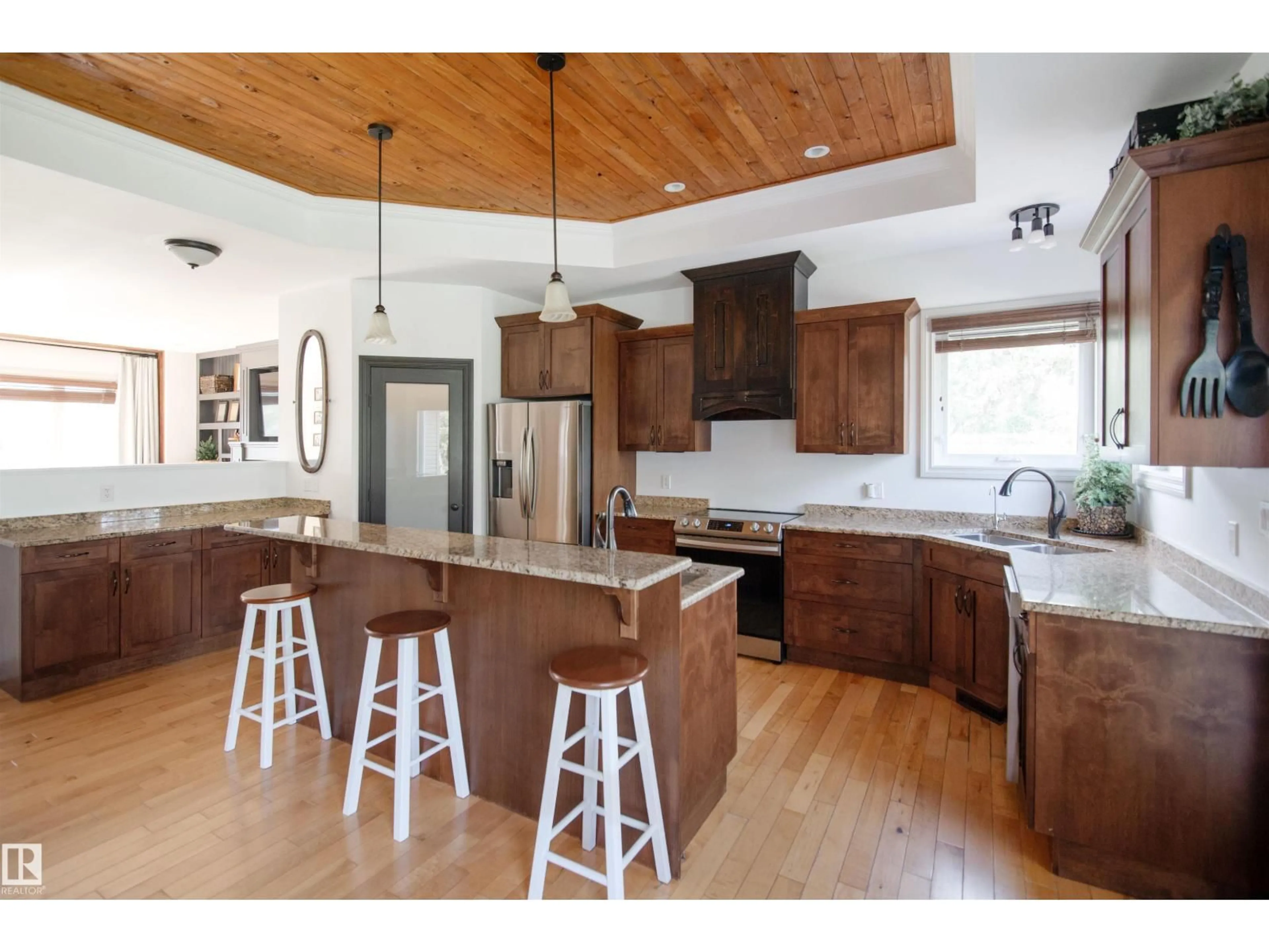 Open concept kitchen, wood/laminate floor for 6 - 61120 RR 465, Rural Bonnyville M.D. Alberta T9N2G9
