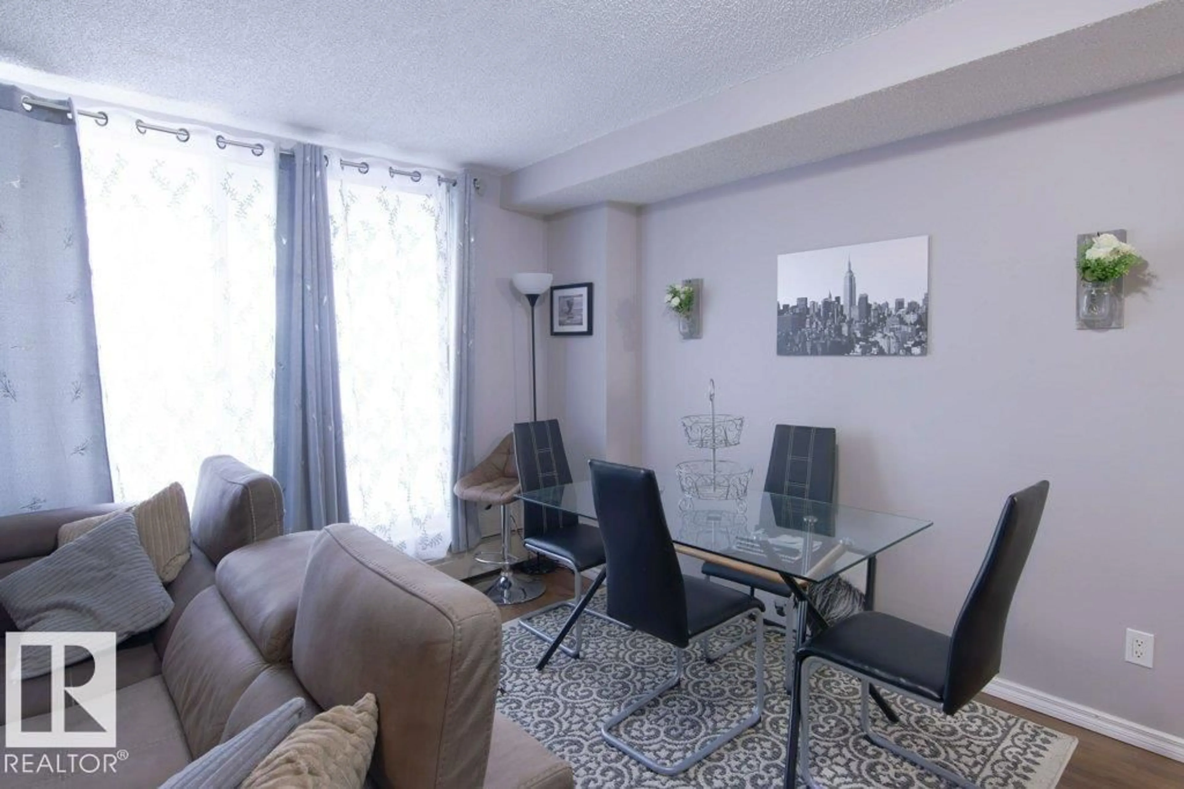 Living room with furniture, unknown for #502 - 12831 66 ST, Edmonton Alberta T5C0A4