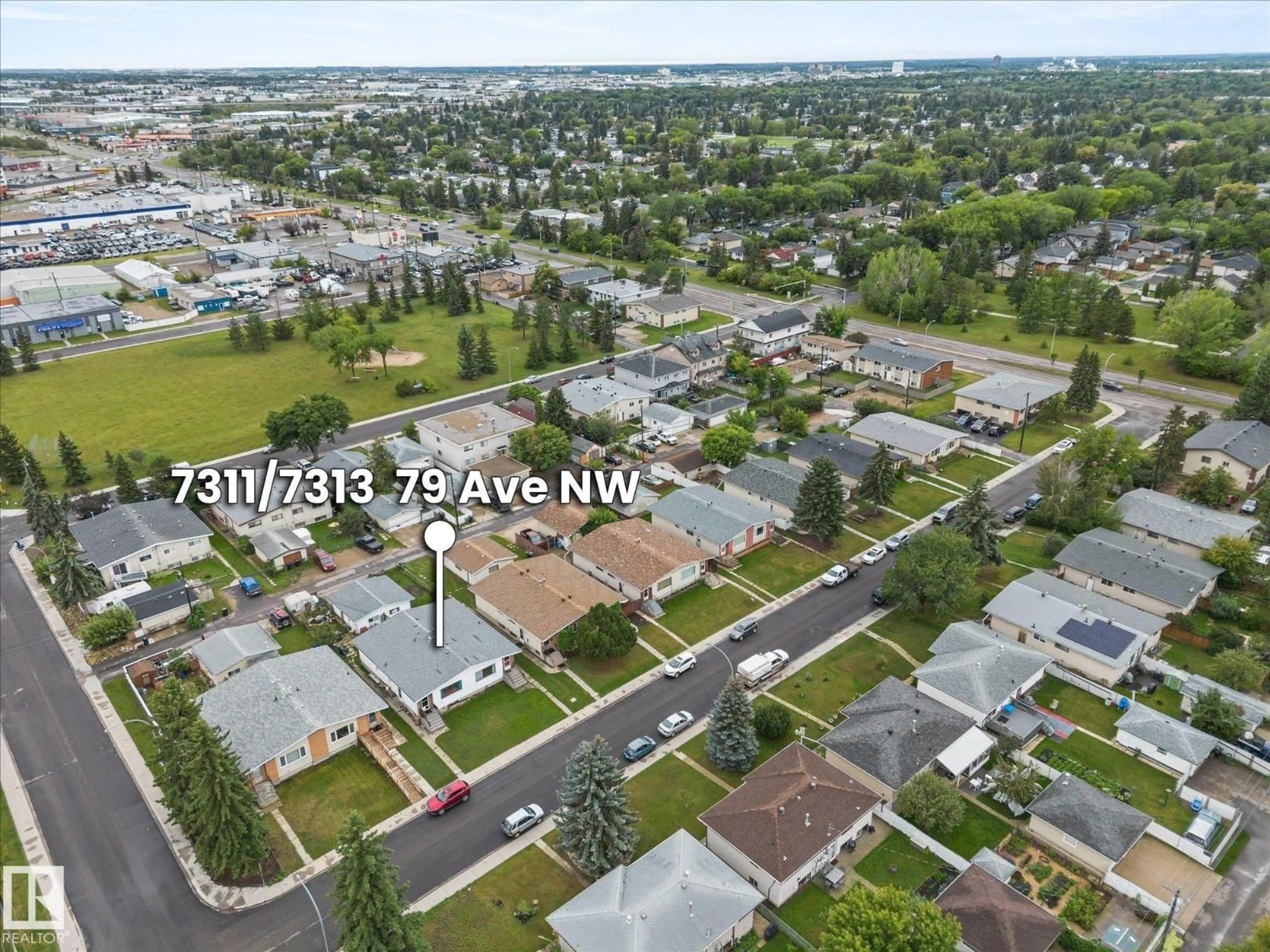 A pic from outside/outdoor area/front of a property/back of a property/a pic from drone, unknown for 7311/7313 79 AV, Edmonton Alberta T6B0C4