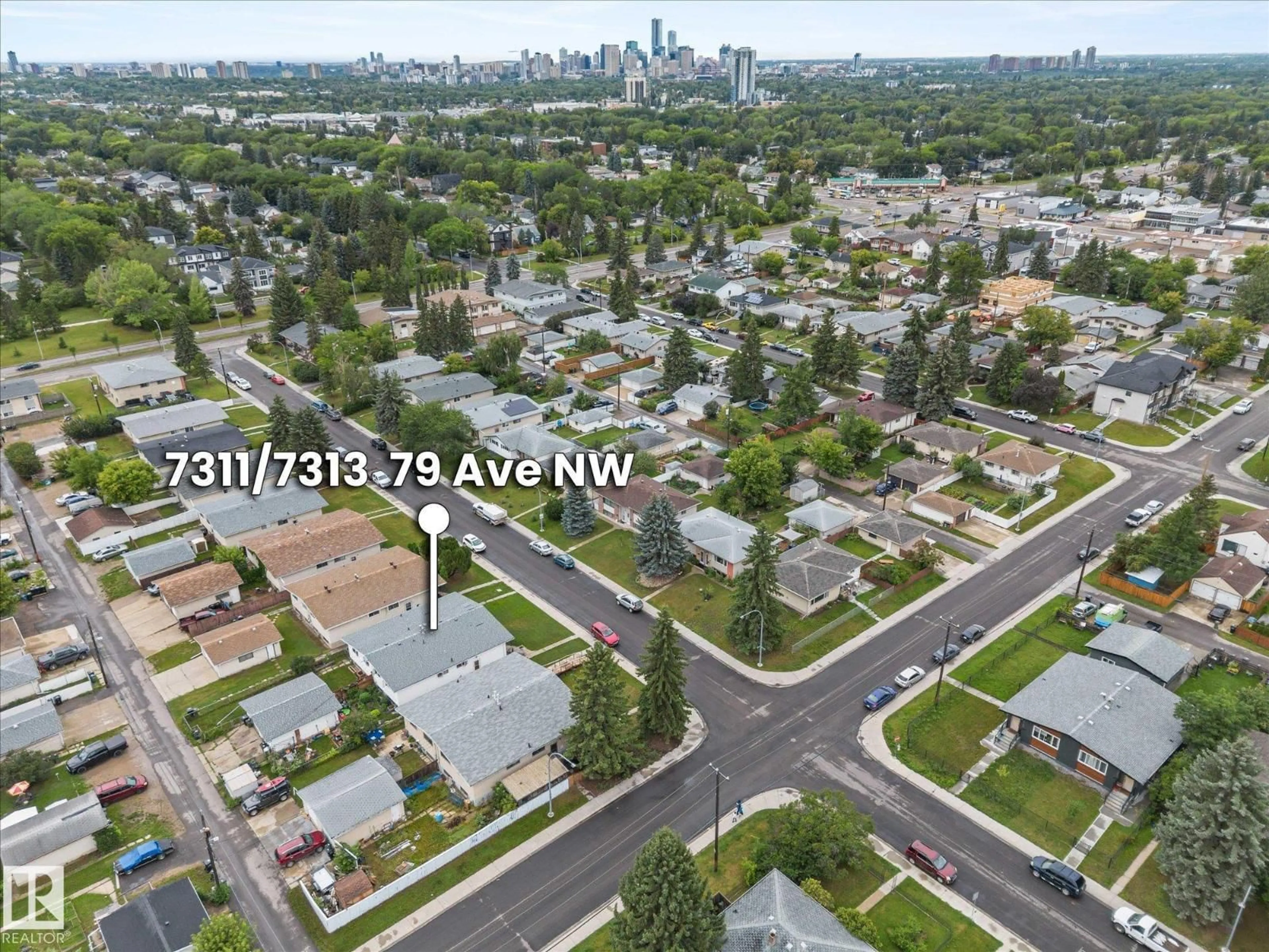 A pic from outside/outdoor area/front of a property/back of a property/a pic from drone, street for 7311/7313 79 AV, Edmonton Alberta T6B0C4