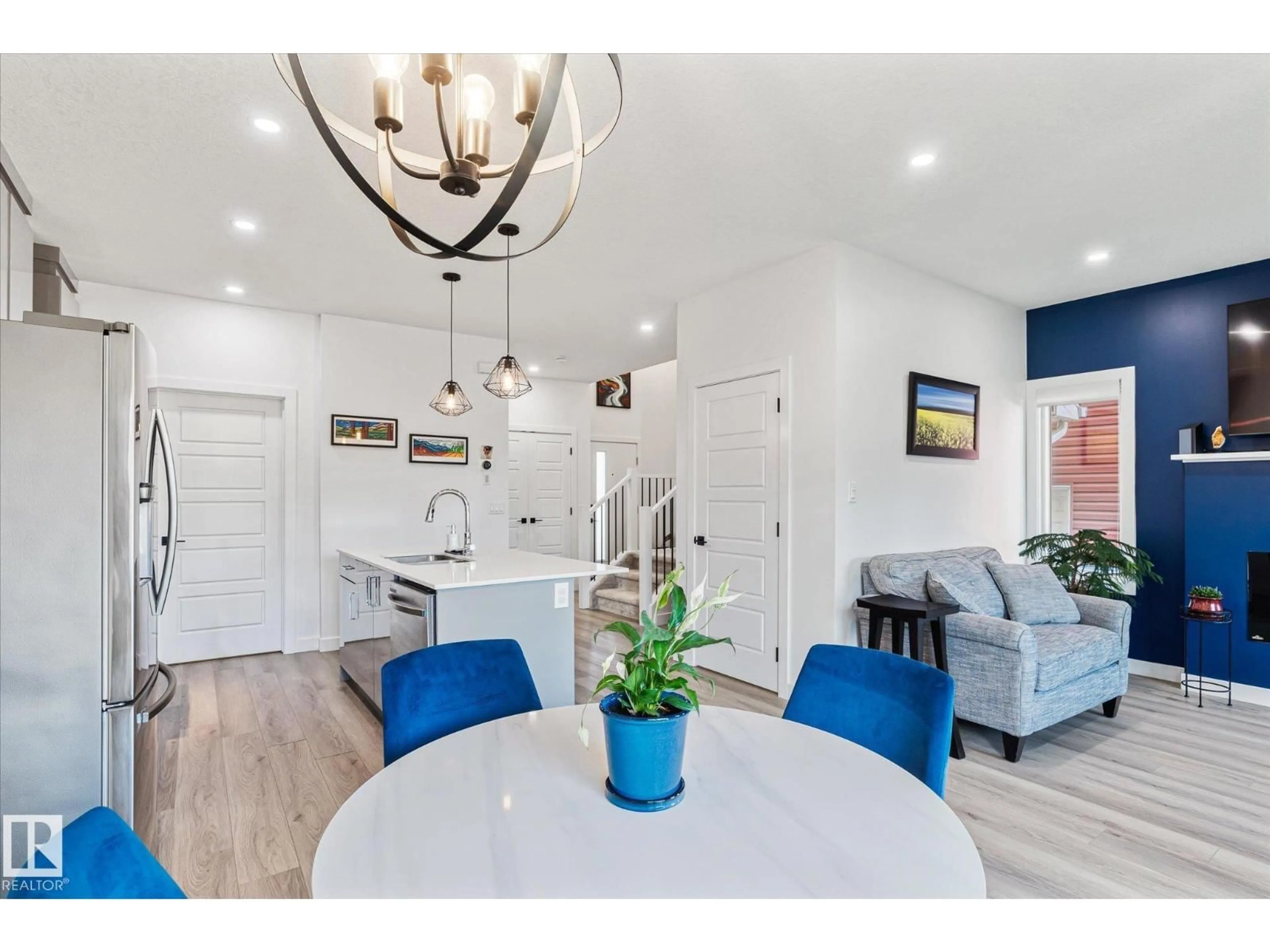 Open concept kitchen, wood/laminate floor for 531 KLEINS CR, Leduc Alberta T9E1M5