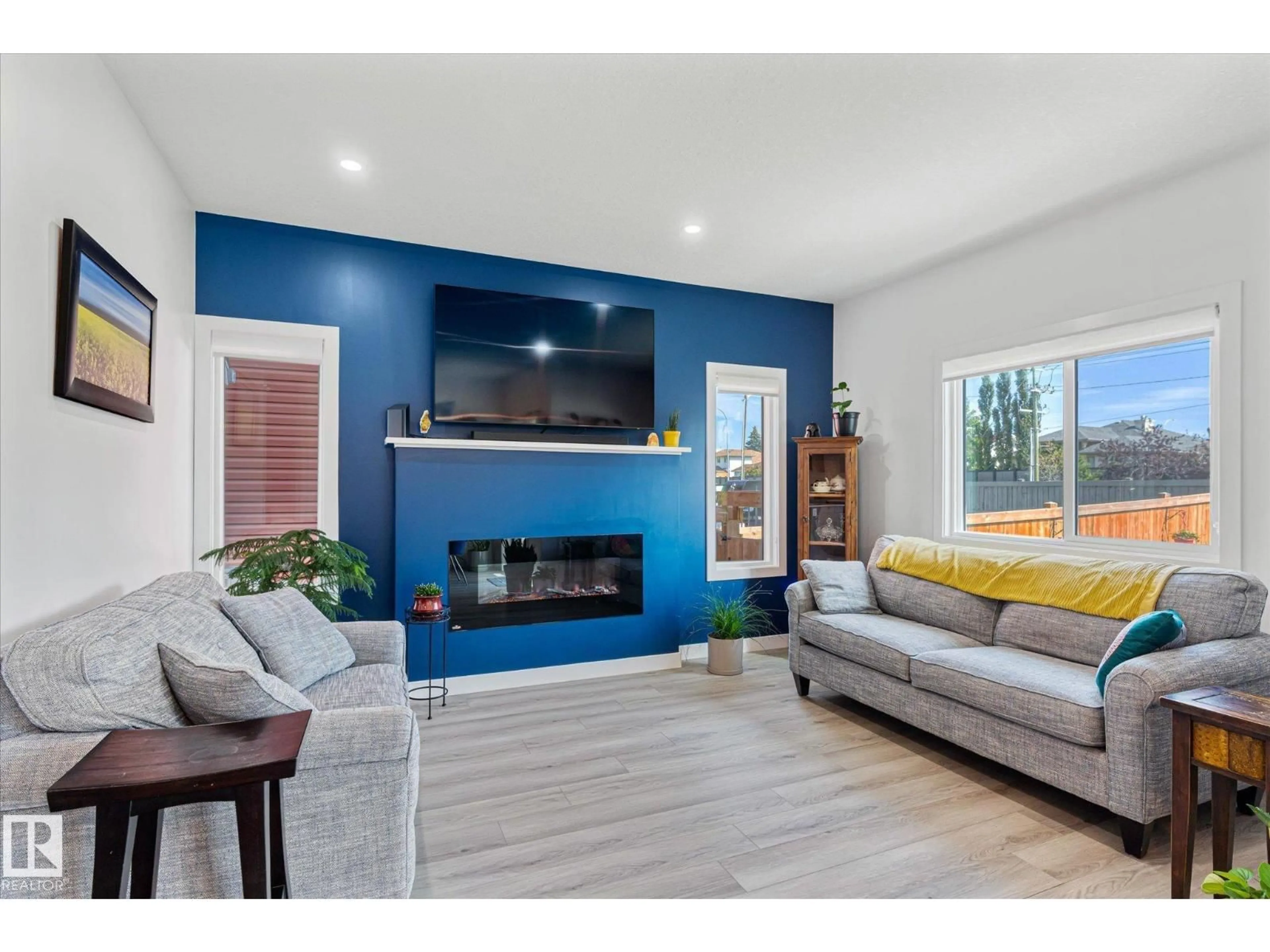 Living room with furniture, wood/laminate floor for 531 KLEINS CR, Leduc Alberta T9E1M5