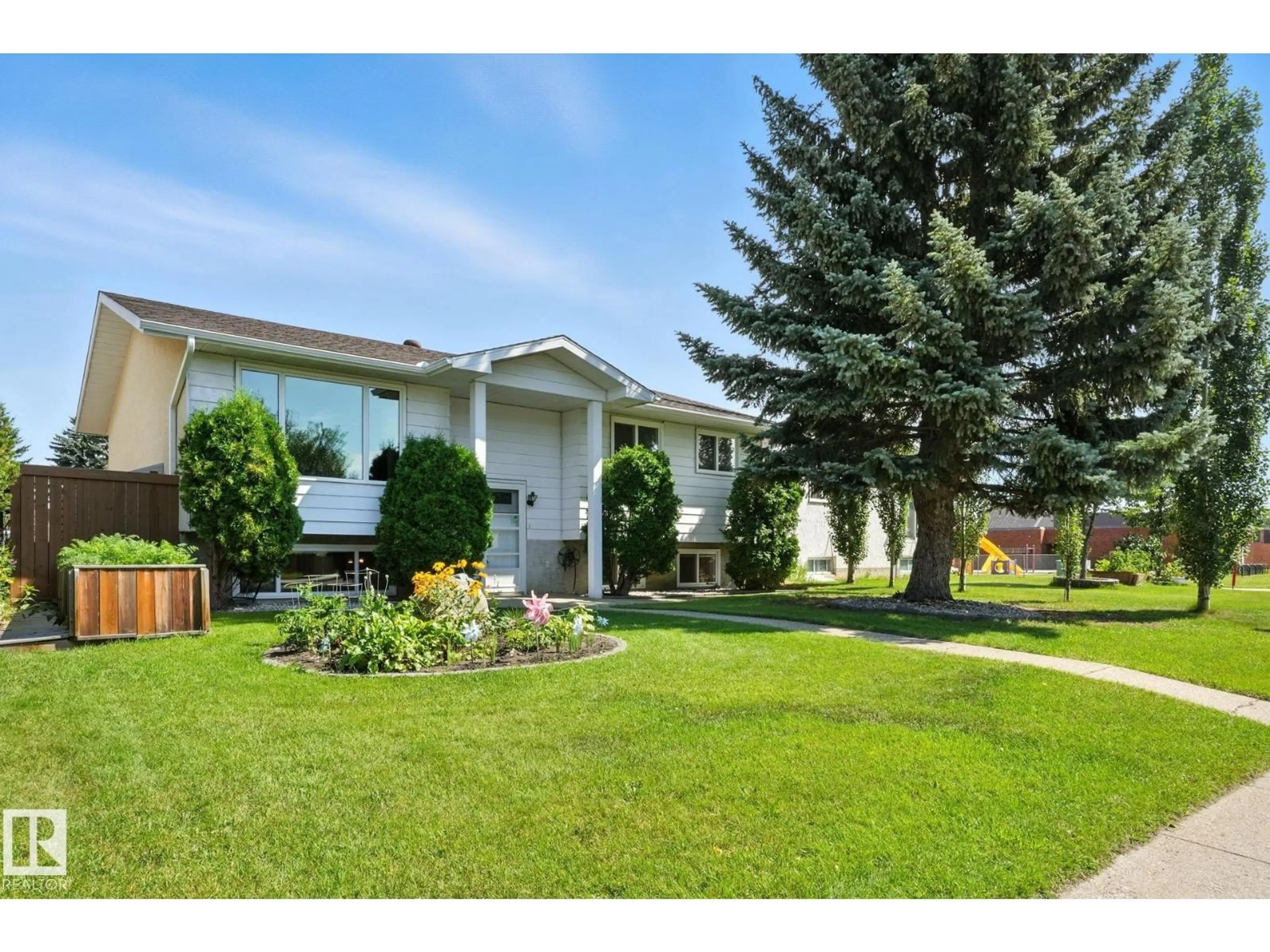Home with vinyl exterior material, street for 1893 48 ST, Edmonton Alberta T6L2T3