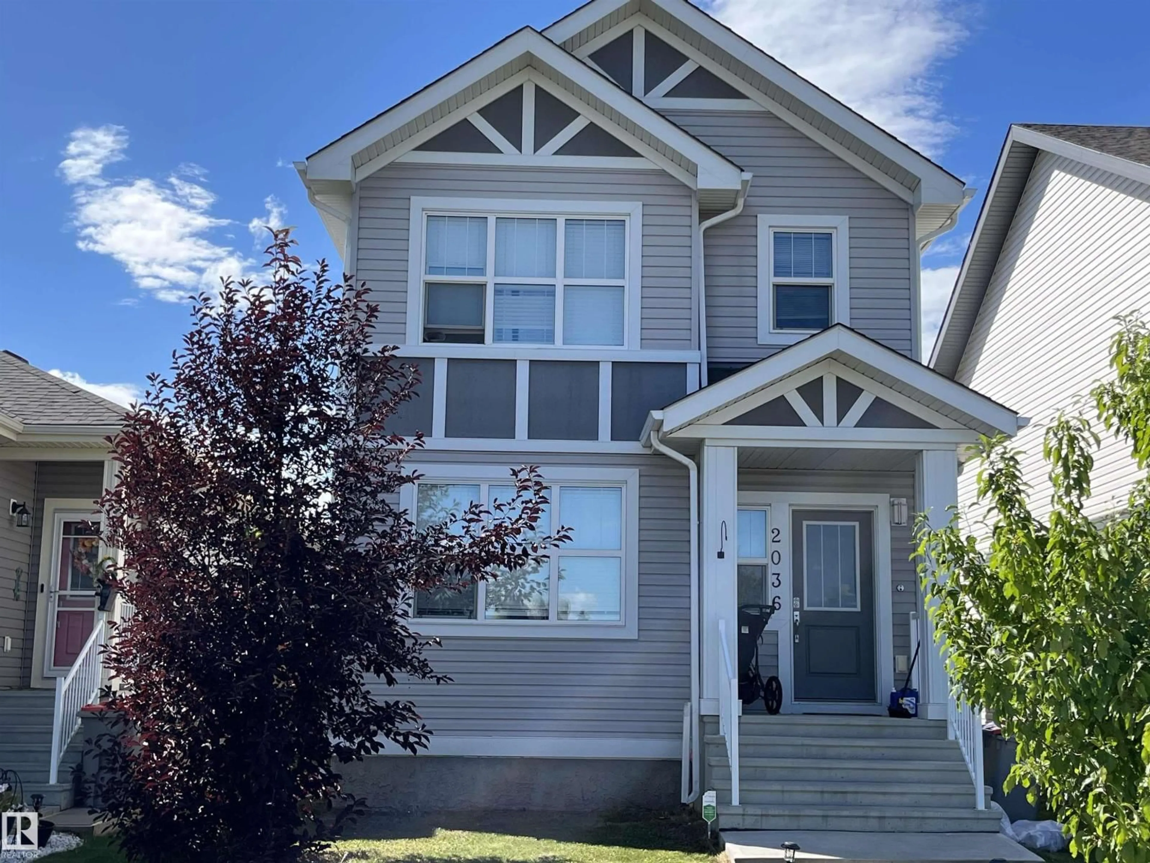 Home with vinyl exterior material, street for 2036 SOUTH CREEK DR, Stony Plain Alberta T7Z0J8