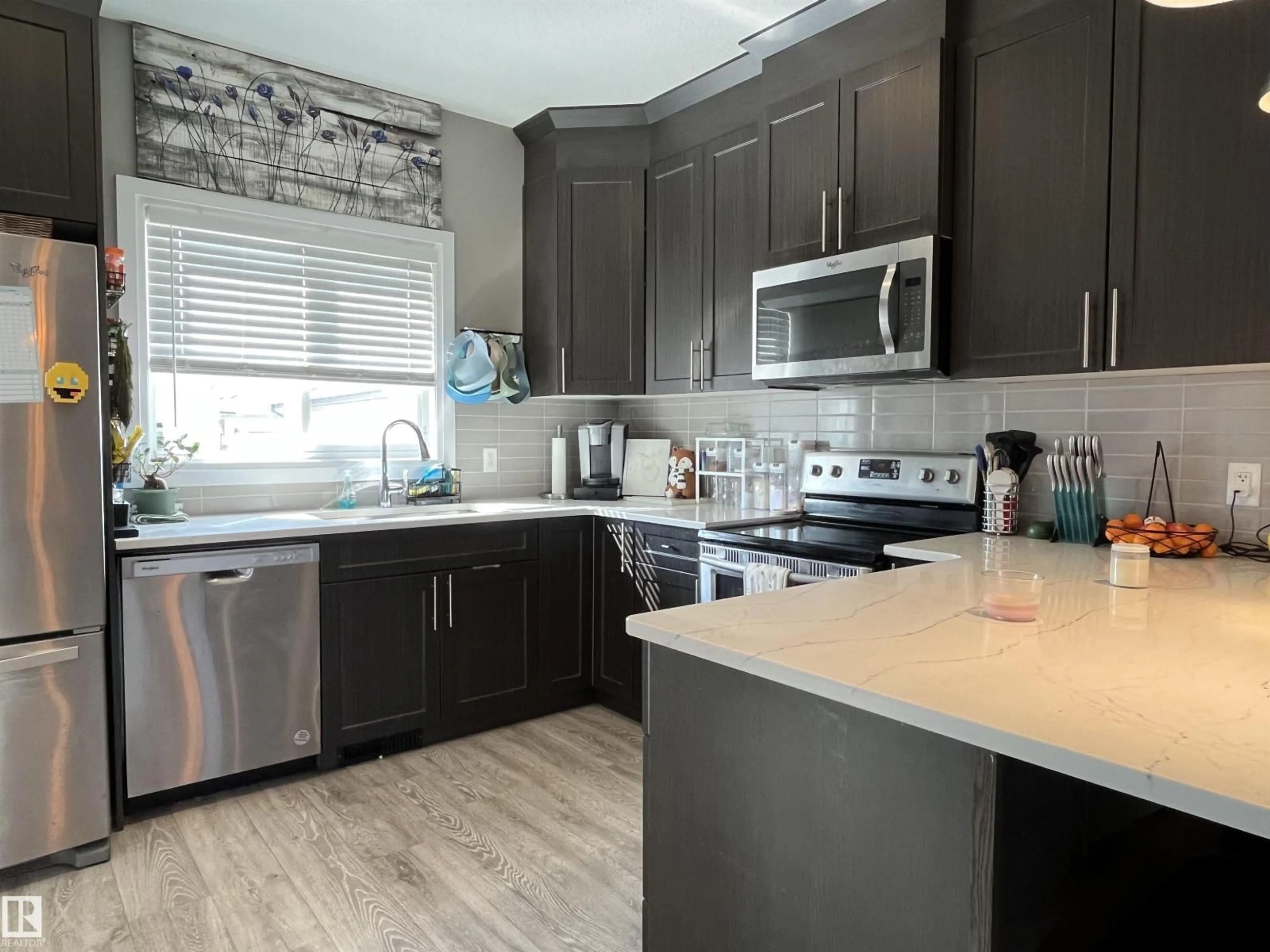Open concept kitchen, unknown for 2036 SOUTH CREEK DR, Stony Plain Alberta T7Z0J8