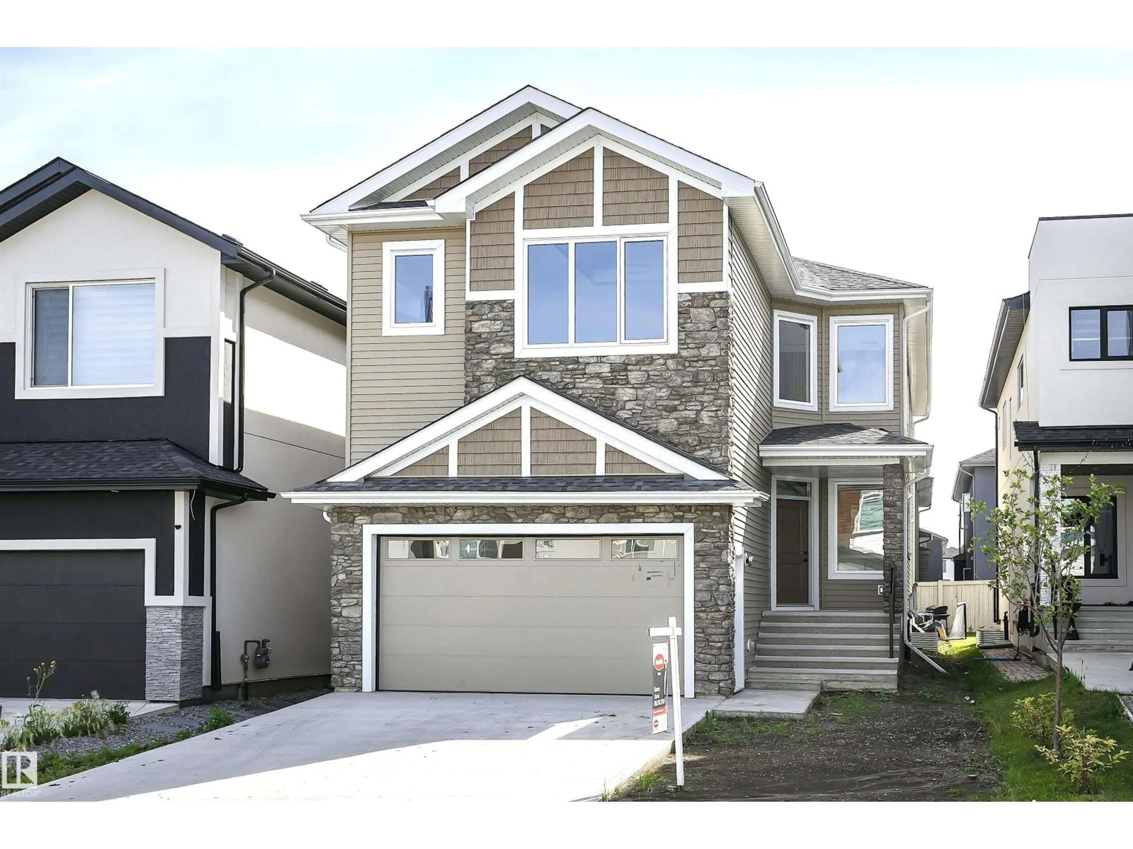 Home with vinyl exterior material, street for NW - 1723 19 ST, Edmonton Alberta T6T2N1