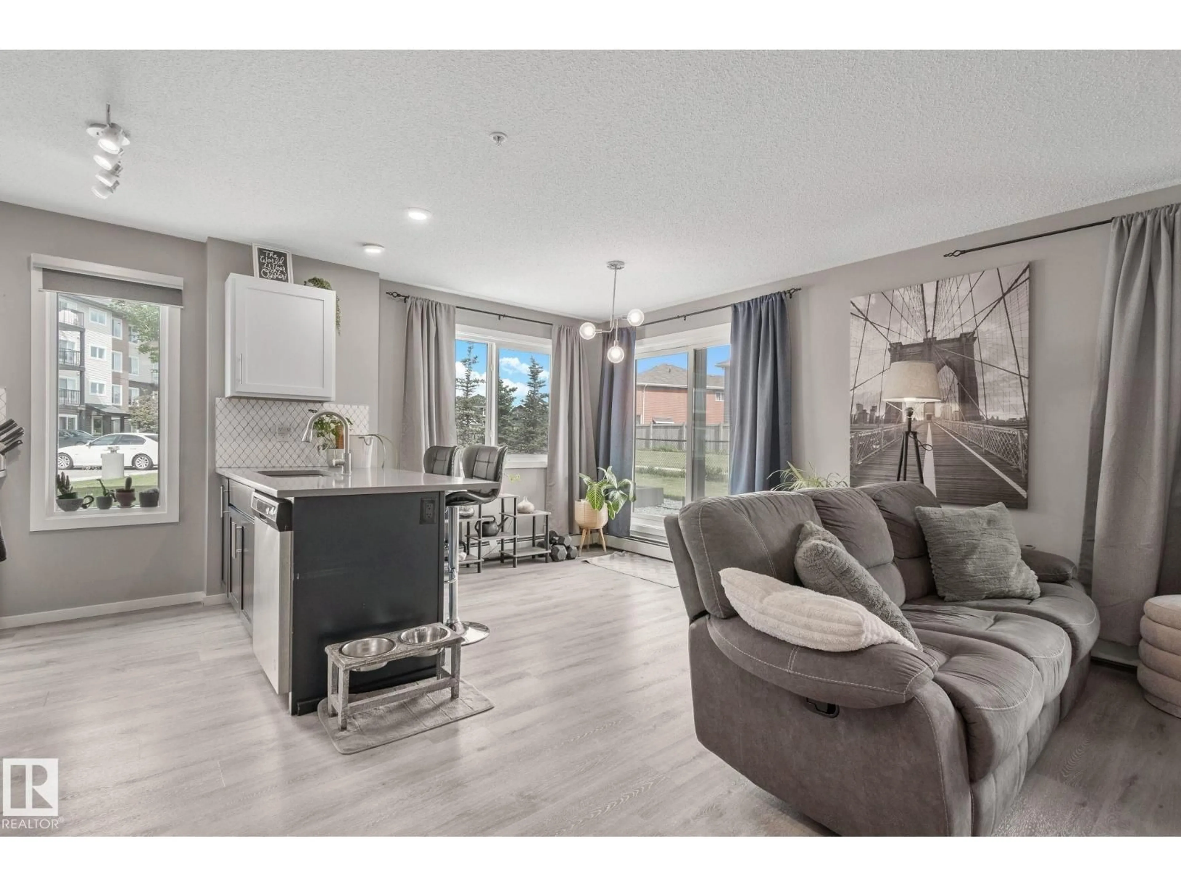 Living room with furniture, unknown for 148 - 121 EBBERS BV, Edmonton Alberta T5Y4A4
