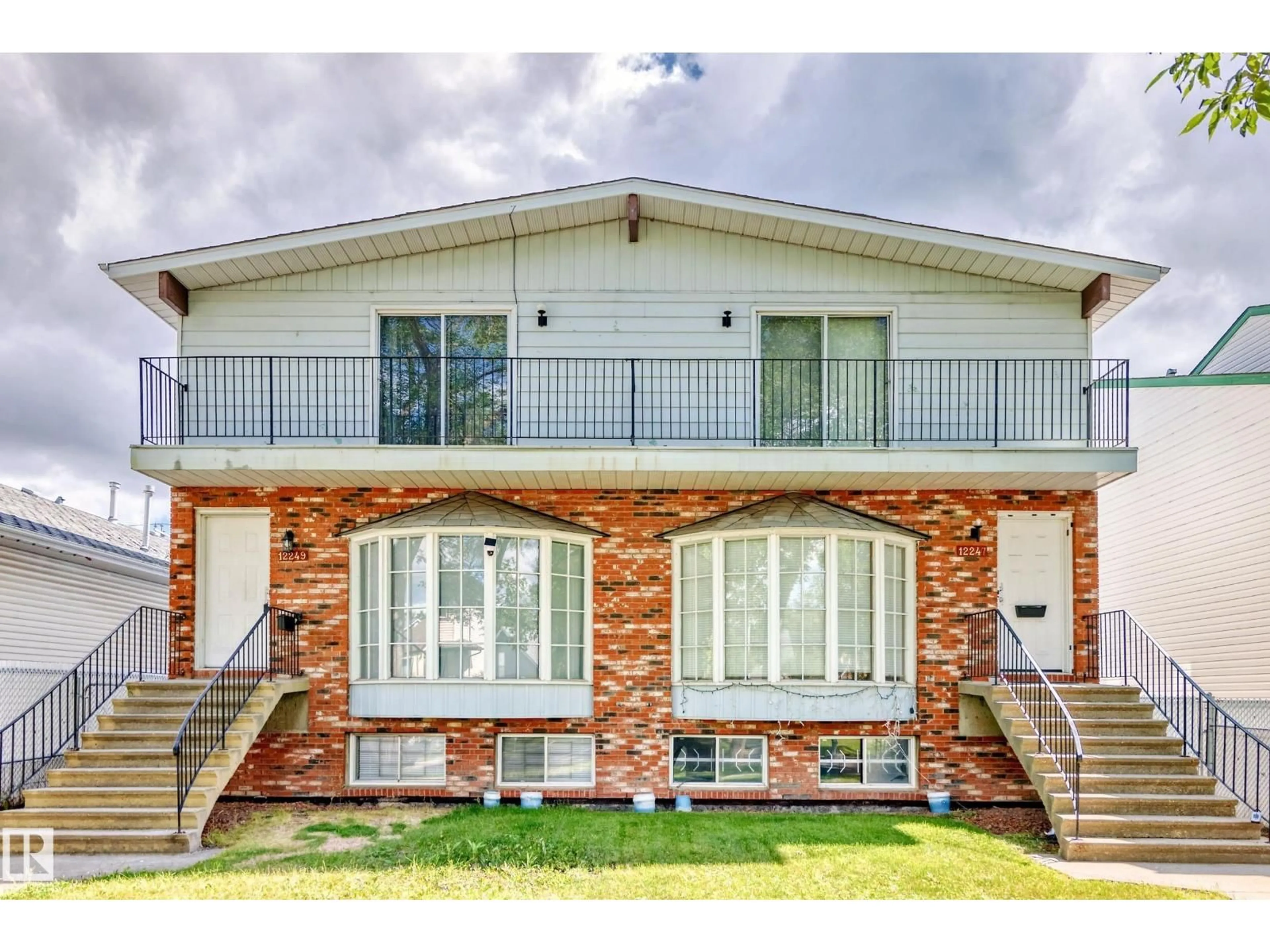 Home with brick exterior material, street for NW - 12247 12249 91 ST, Edmonton Alberta T5B4C4