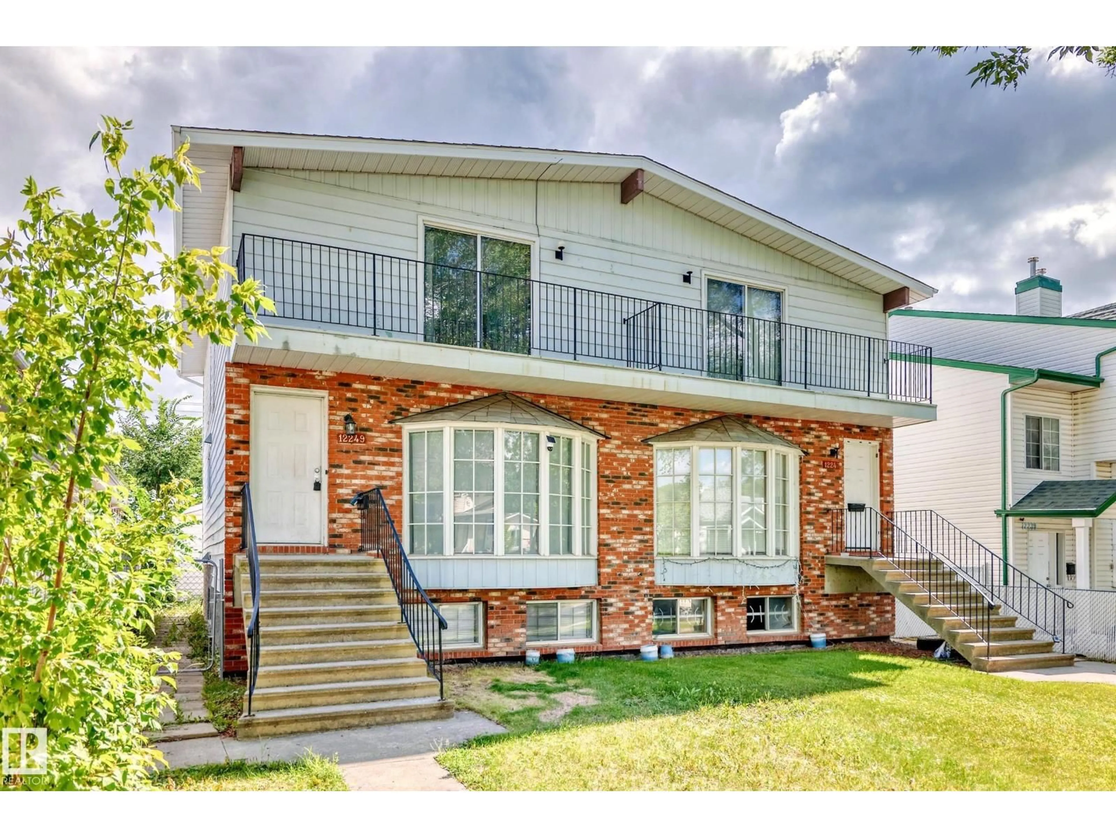 Home with brick exterior material, street for NW - 12247 12249 91 ST, Edmonton Alberta T5B4C4
