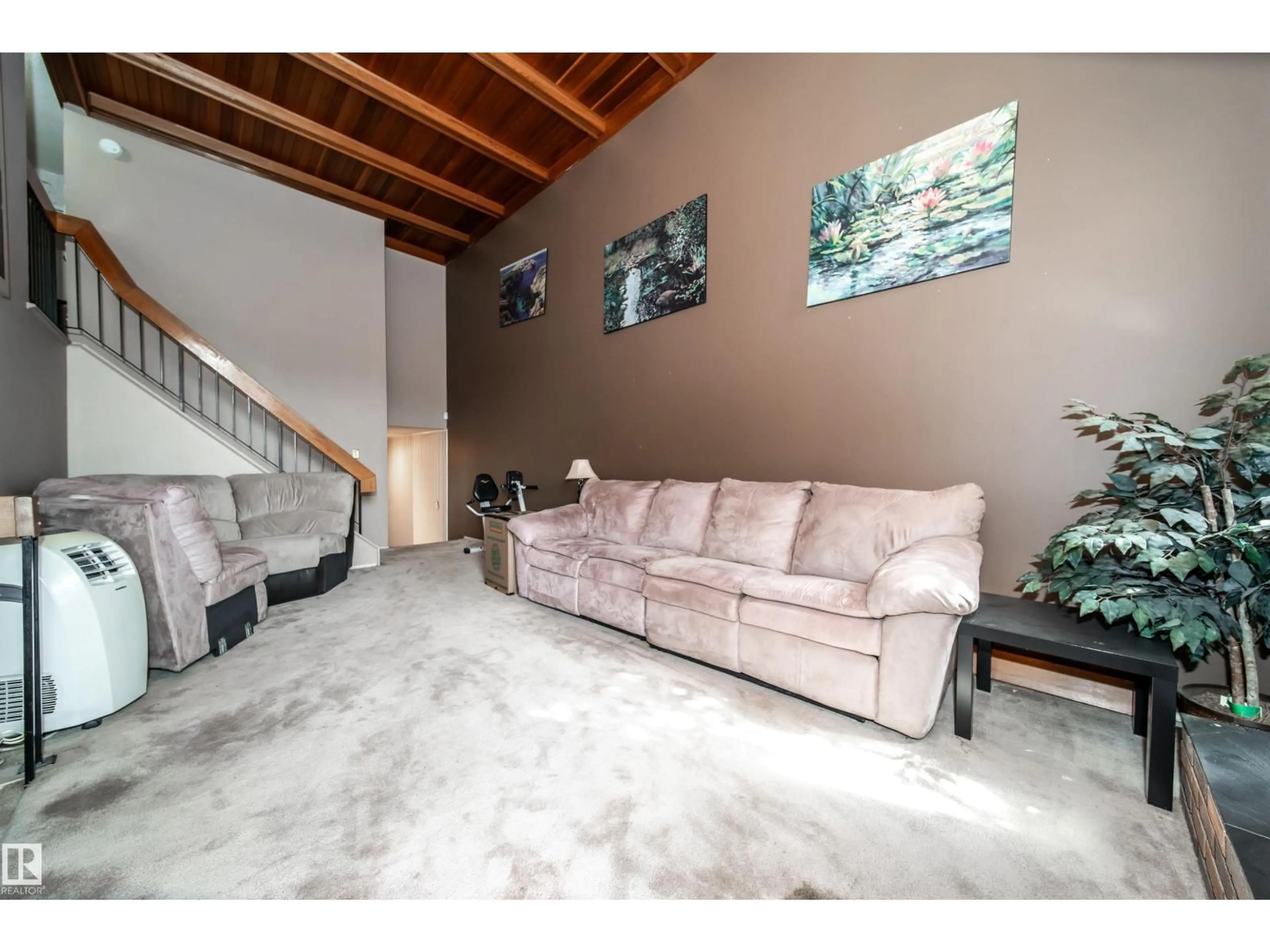 Living room with furniture, unknown for 18111 76 AV, Edmonton Alberta T5T2E9