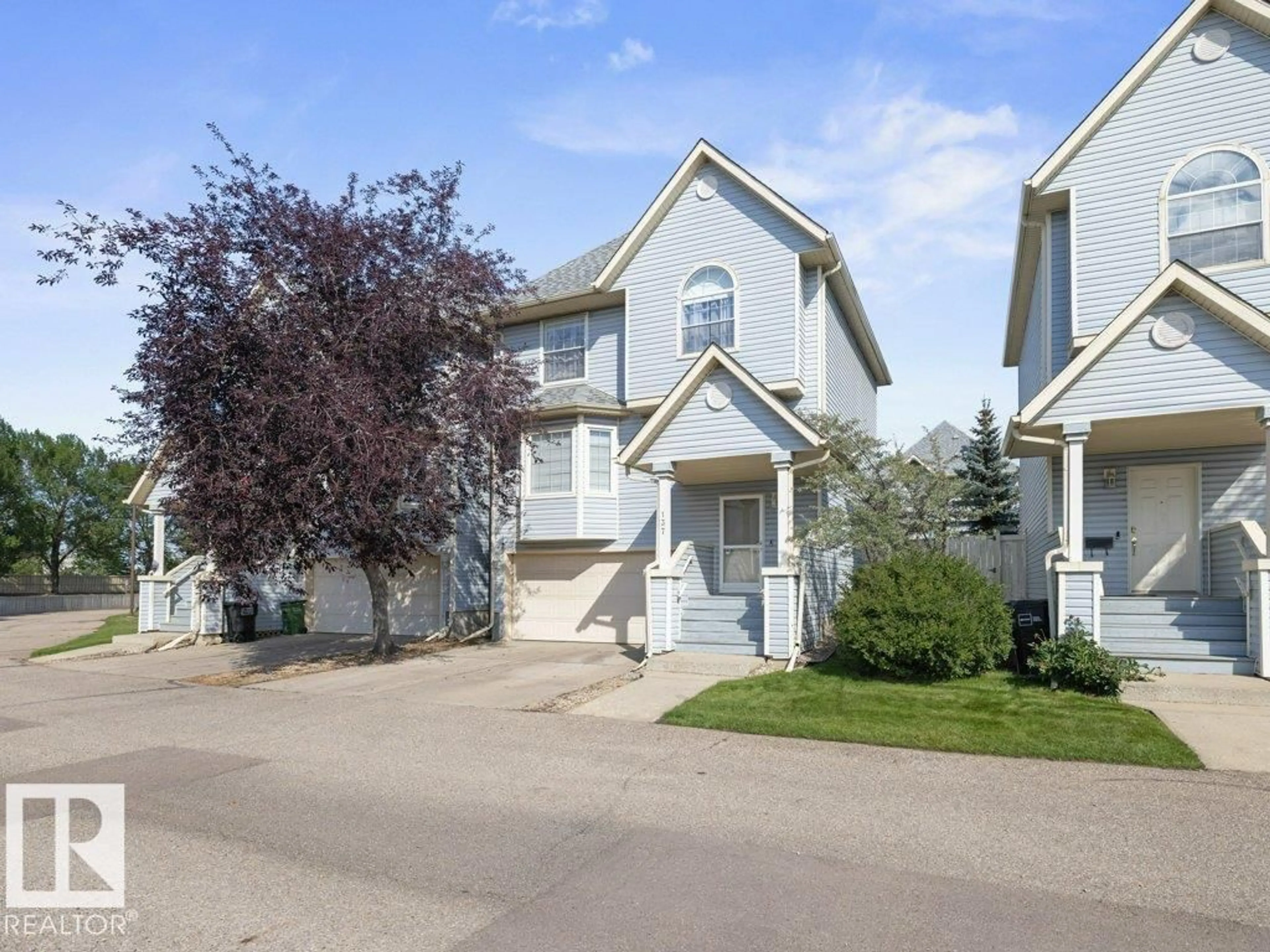 Home with vinyl exterior material, street for 1670 - 137 JAMHA RD, Edmonton Alberta T6L7B3