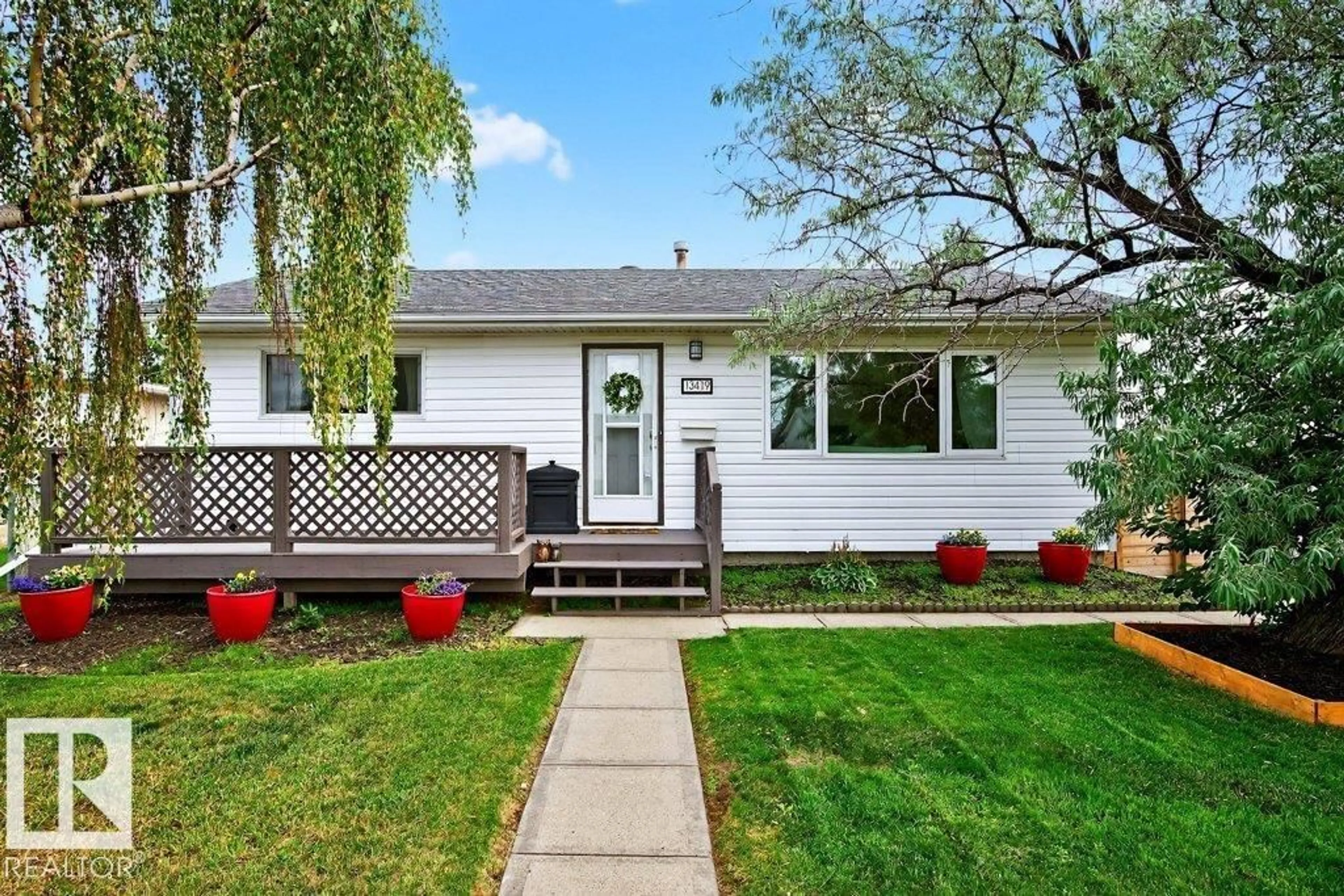 Home with vinyl exterior material, street for NW - 13419 58 ST, Edmonton Alberta T5A0R2