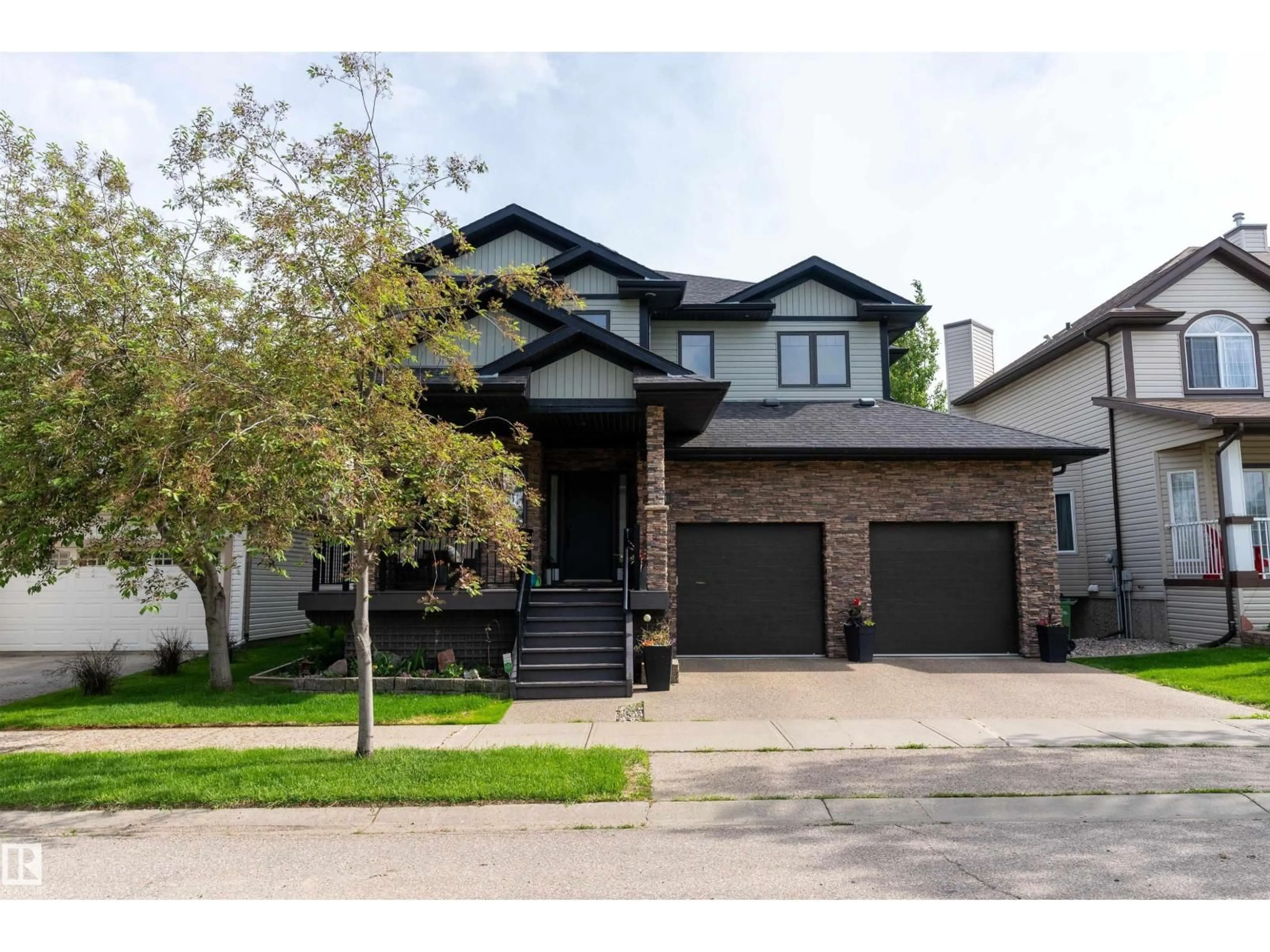 Home with brick exterior material, street for NW - 1681 TOANE WD, Edmonton Alberta T6R2W7