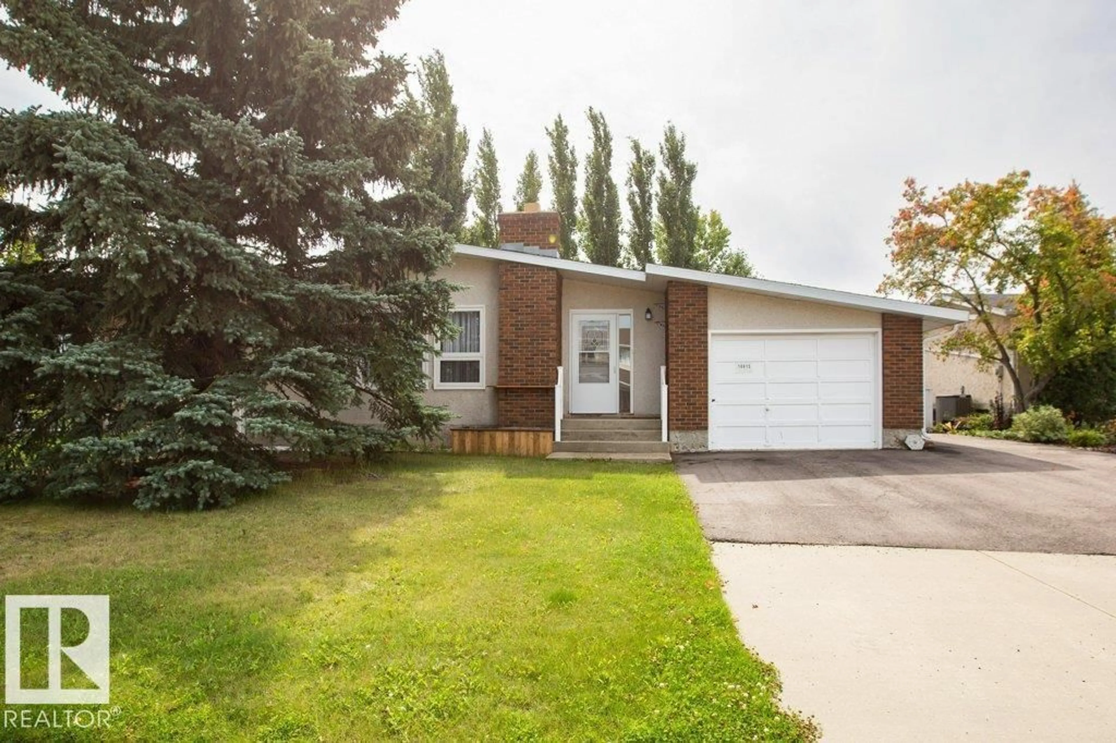 Home with vinyl exterior material, street for 10615 108 ST, Westlock Alberta T7P1E1