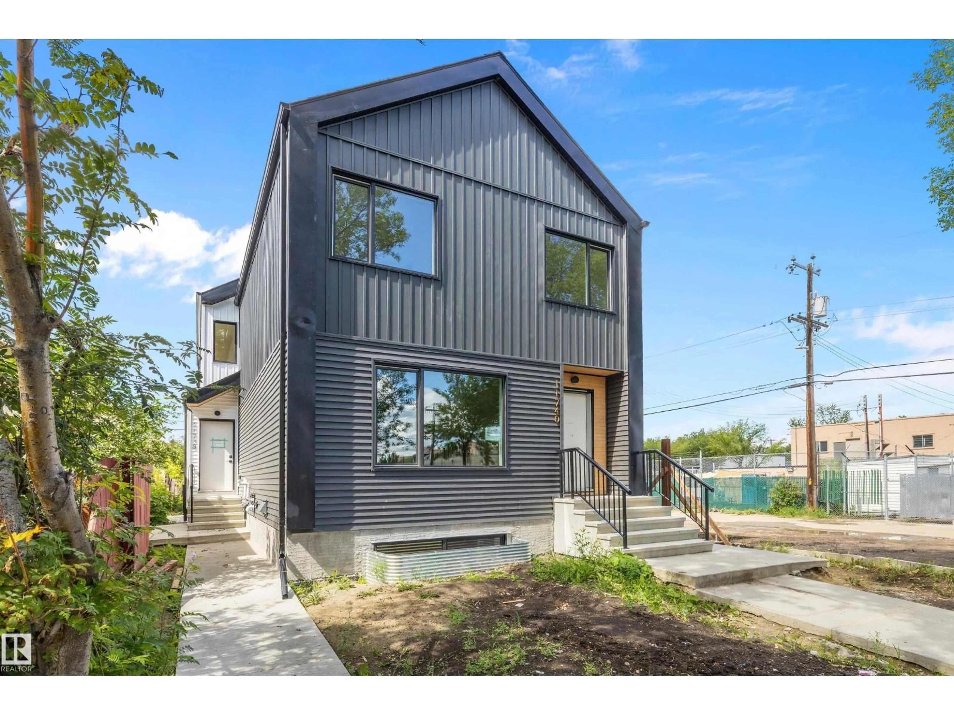 Home with vinyl exterior material, street for 11738 91 ST, Edmonton Alberta T5B4B3