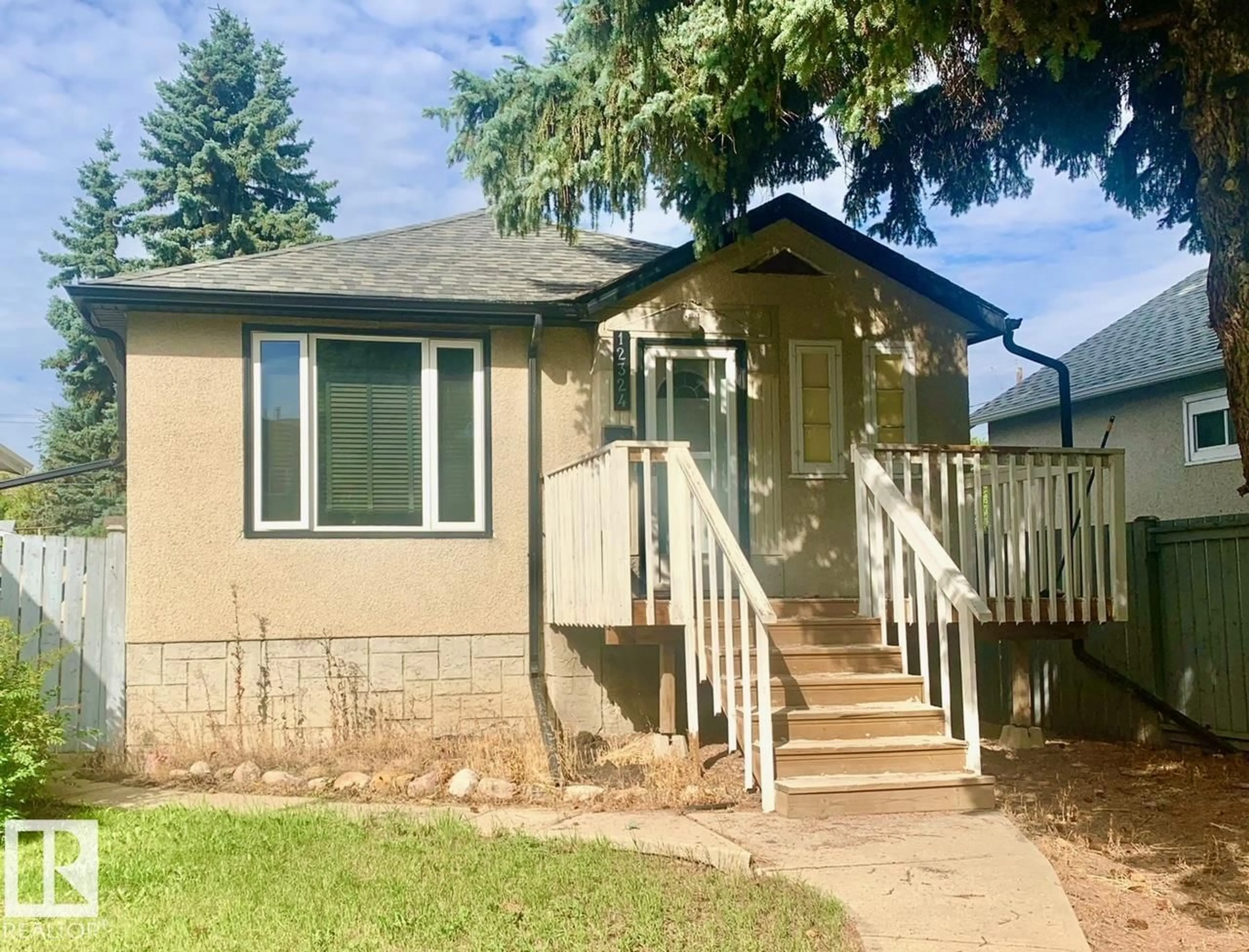 Home with vinyl exterior material, street for 12324 86 ST, Edmonton Alberta T5B3L2