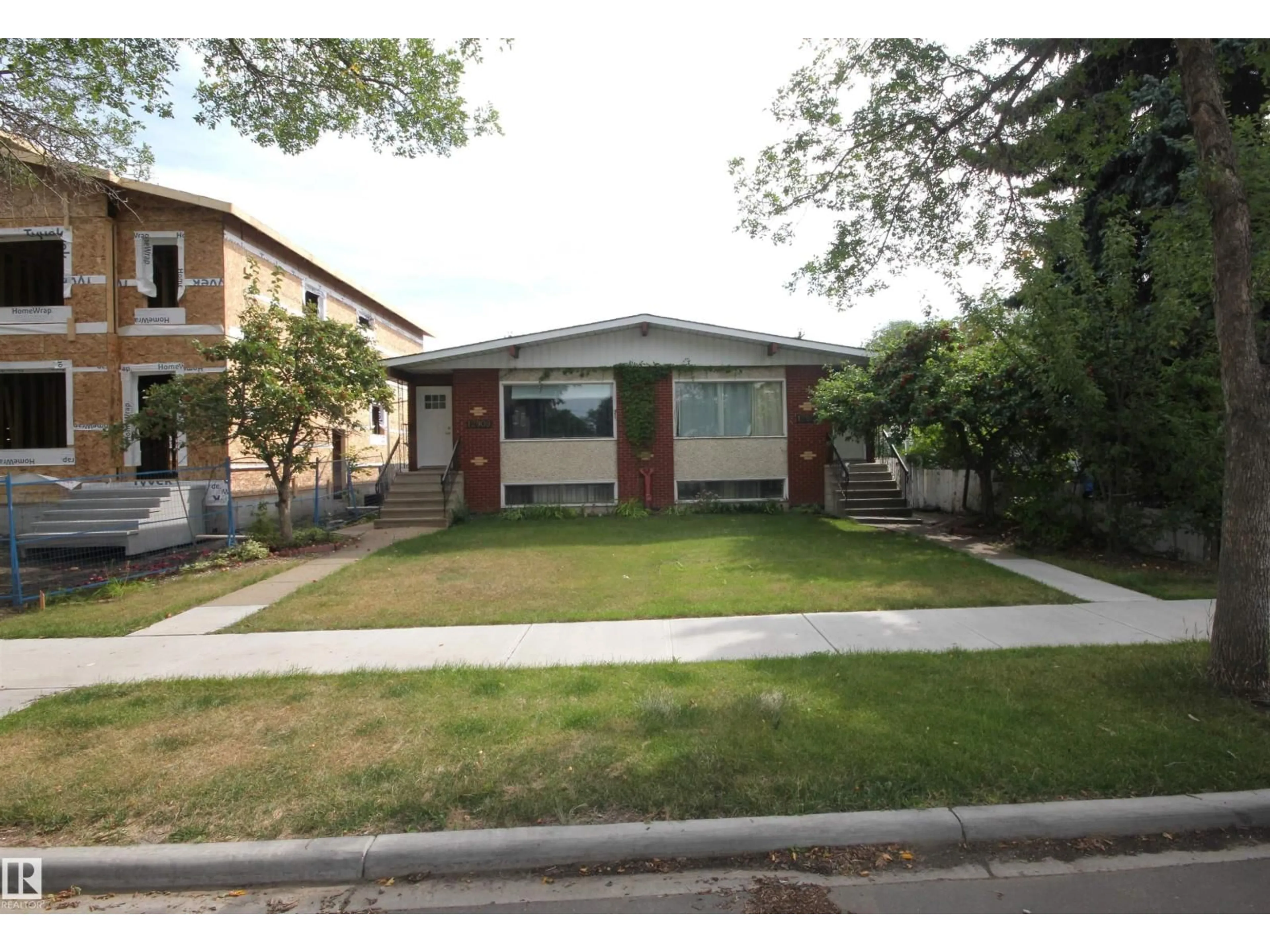 Home with brick exterior material, street for NW - 12907 & 12909 123 ST, Edmonton Alberta T5L0A7