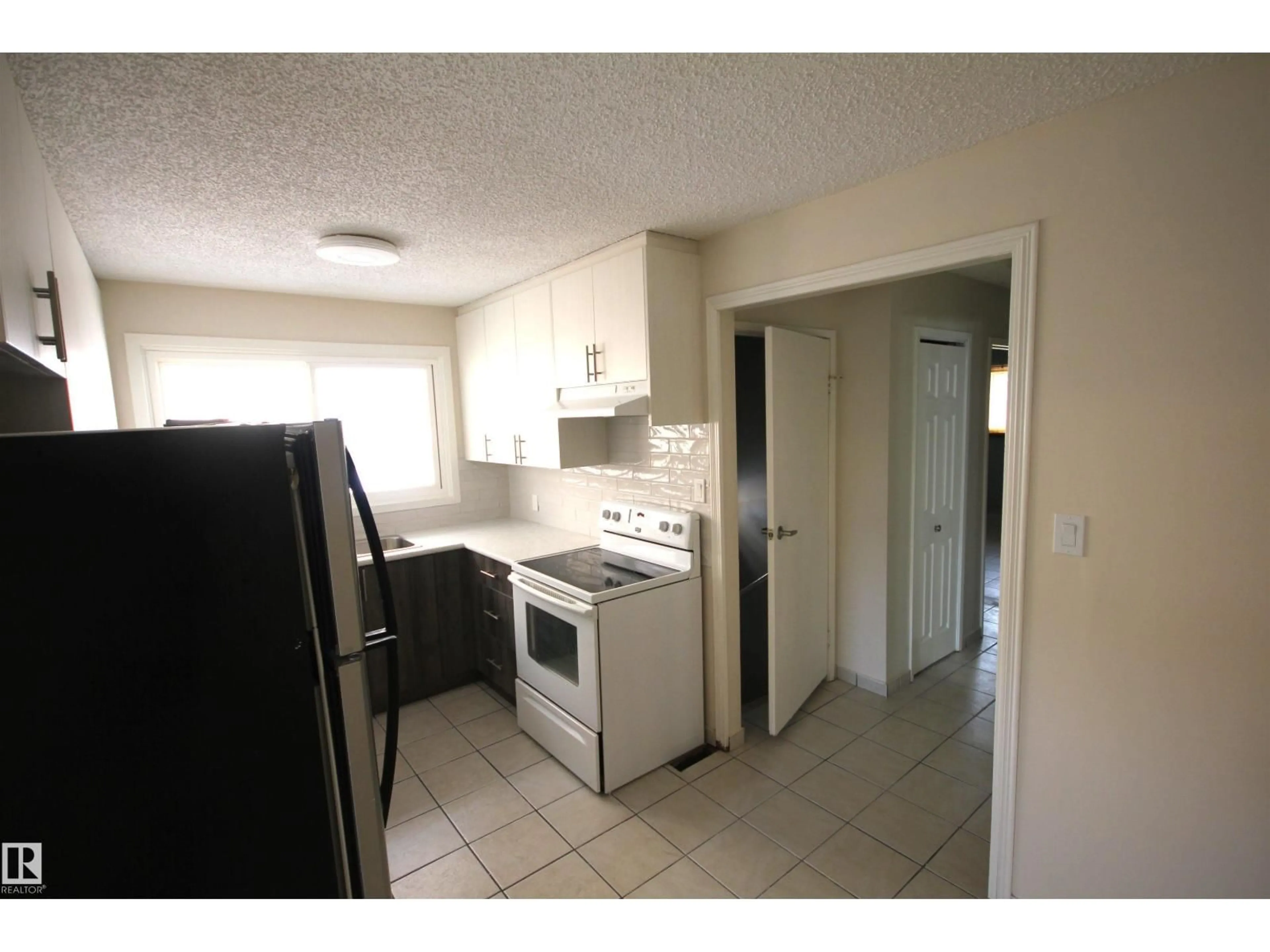 Standard kitchen, unknown for NW - 12907 & 12909 123 ST, Edmonton Alberta T5L0A7