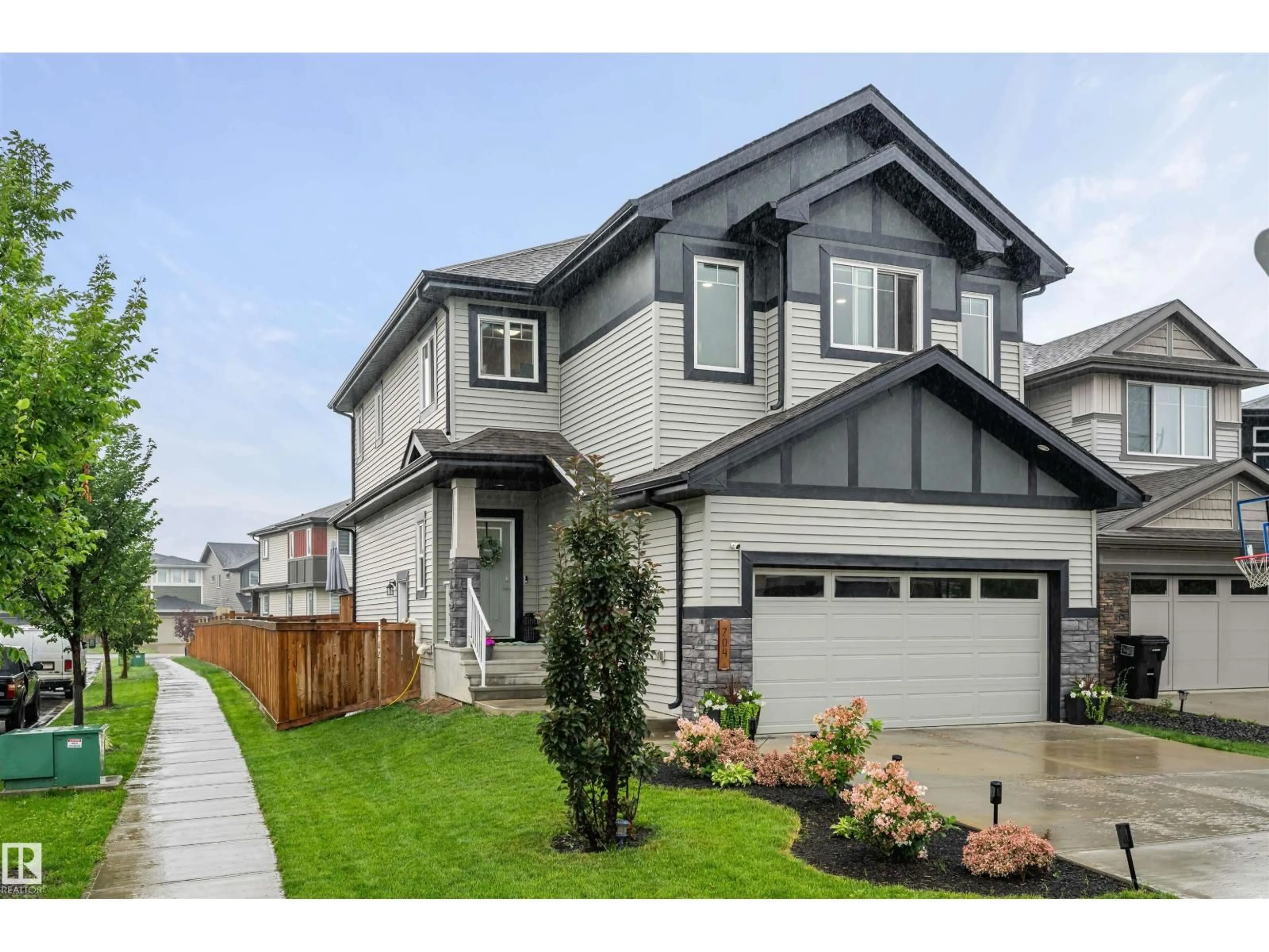 Home with vinyl exterior material, street for SW - 704 CONROY CO, Edmonton Alberta T6W4H5