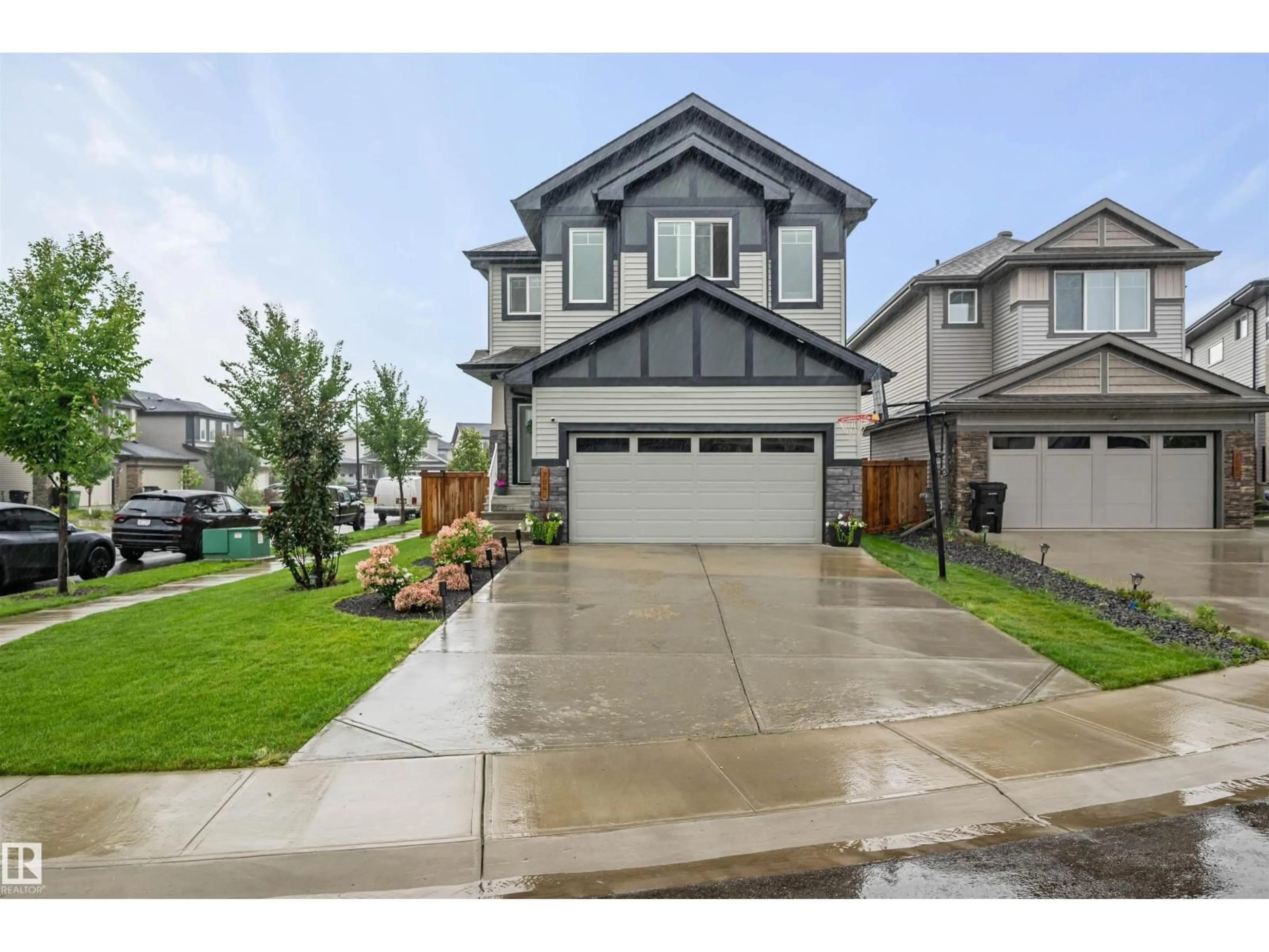Home with vinyl exterior material, street for SW - 704 CONROY CO, Edmonton Alberta T6W4H5