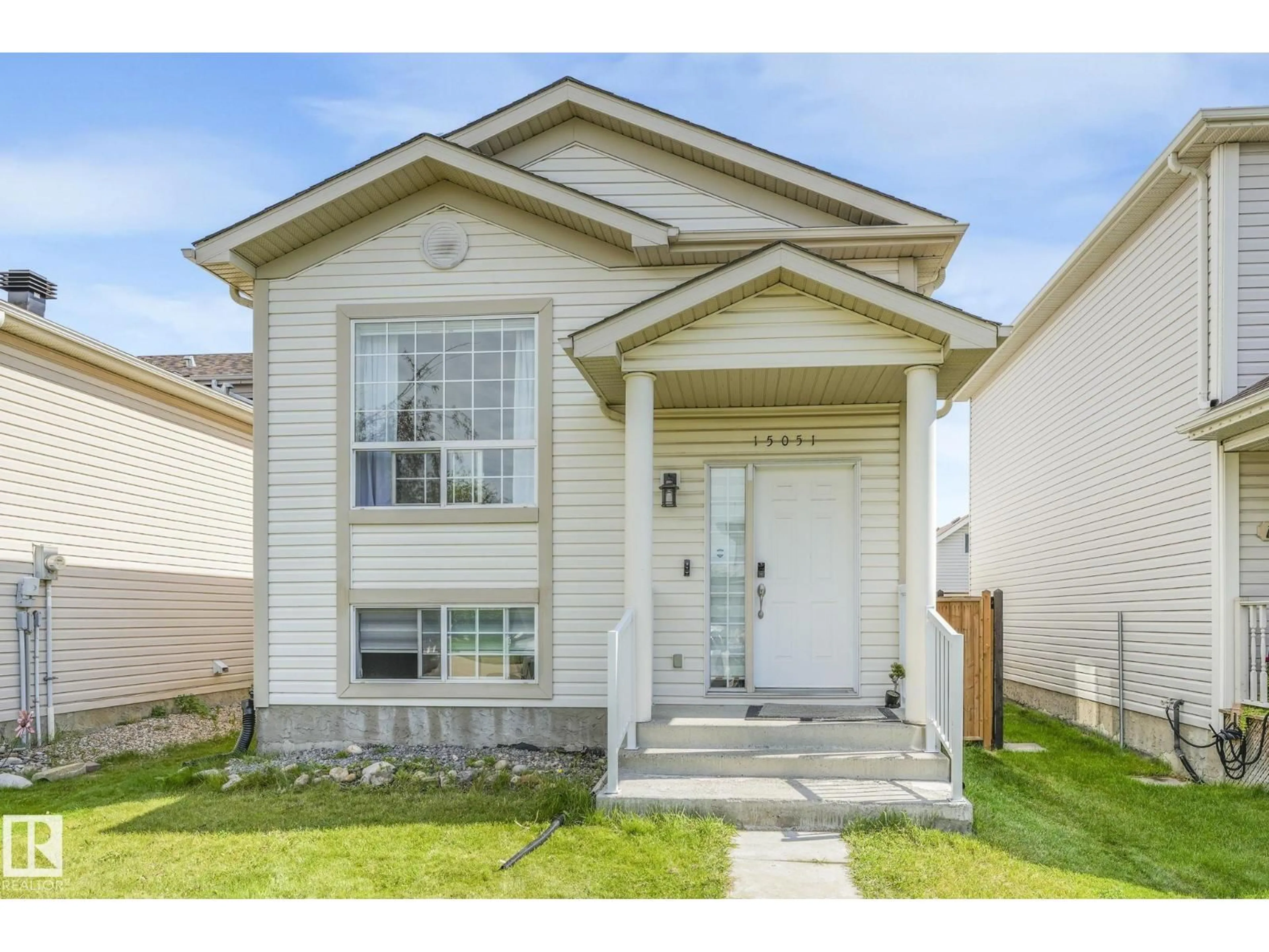 Home with vinyl exterior material, street for NW - 15051 132 ST, Edmonton Alberta T6V1K8