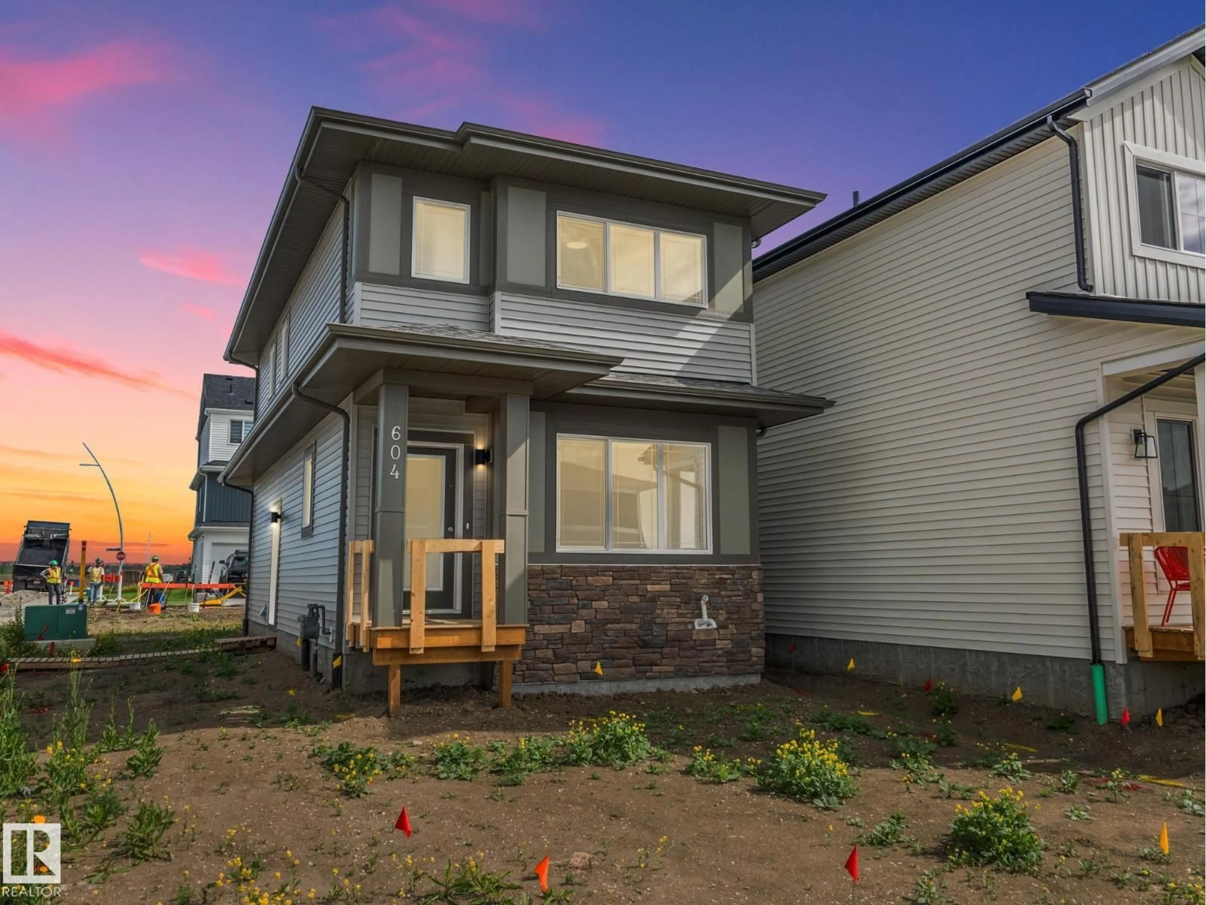 Home with vinyl exterior material, street for NE - 604 174 AV, Edmonton Alberta T5Y4G1