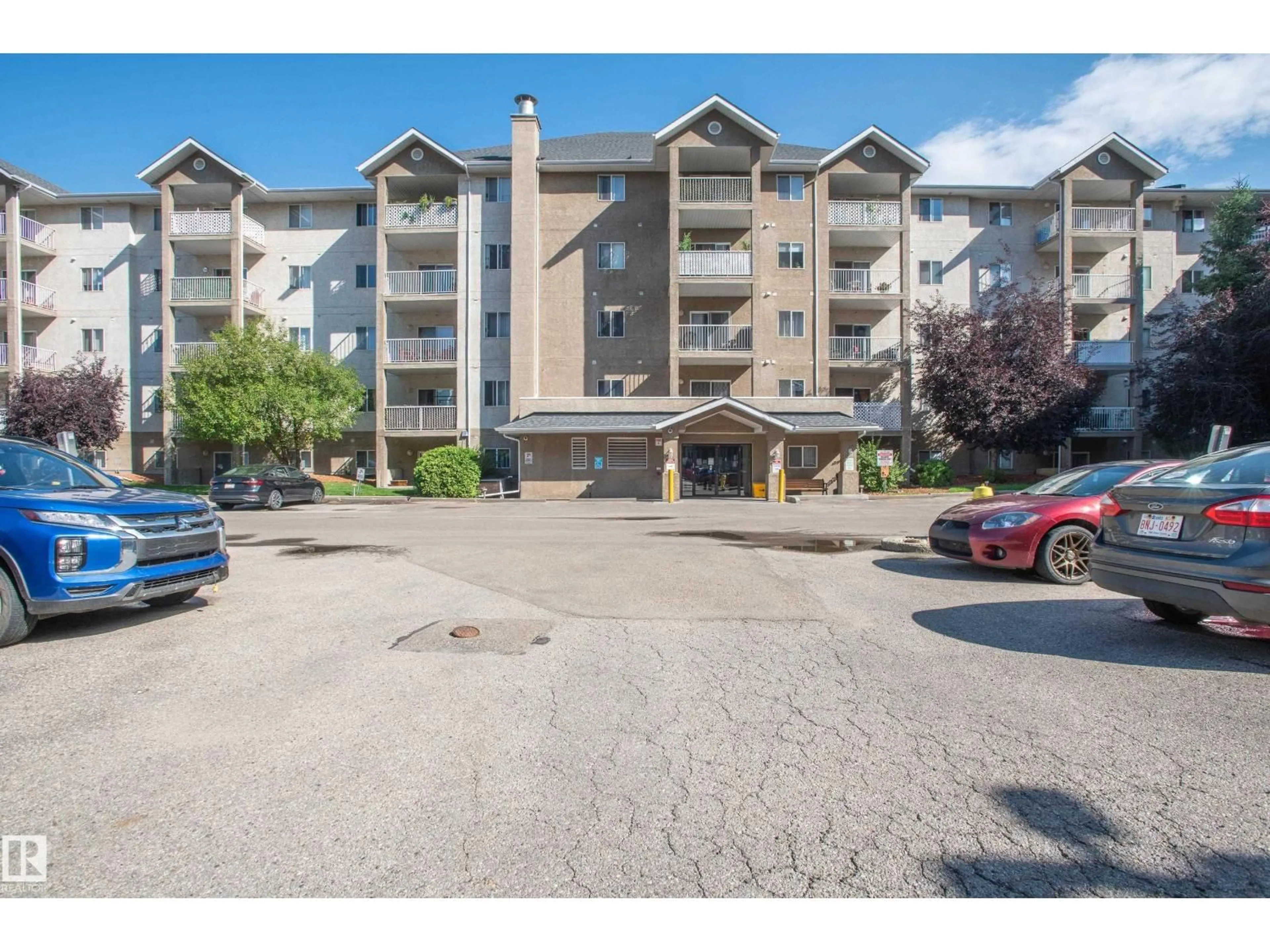 A pic from outside/outdoor area/front of a property/back of a property/a pic from drone, mountain view for 117 10535 122 ST NW, Edmonton Alberta T5N4B7