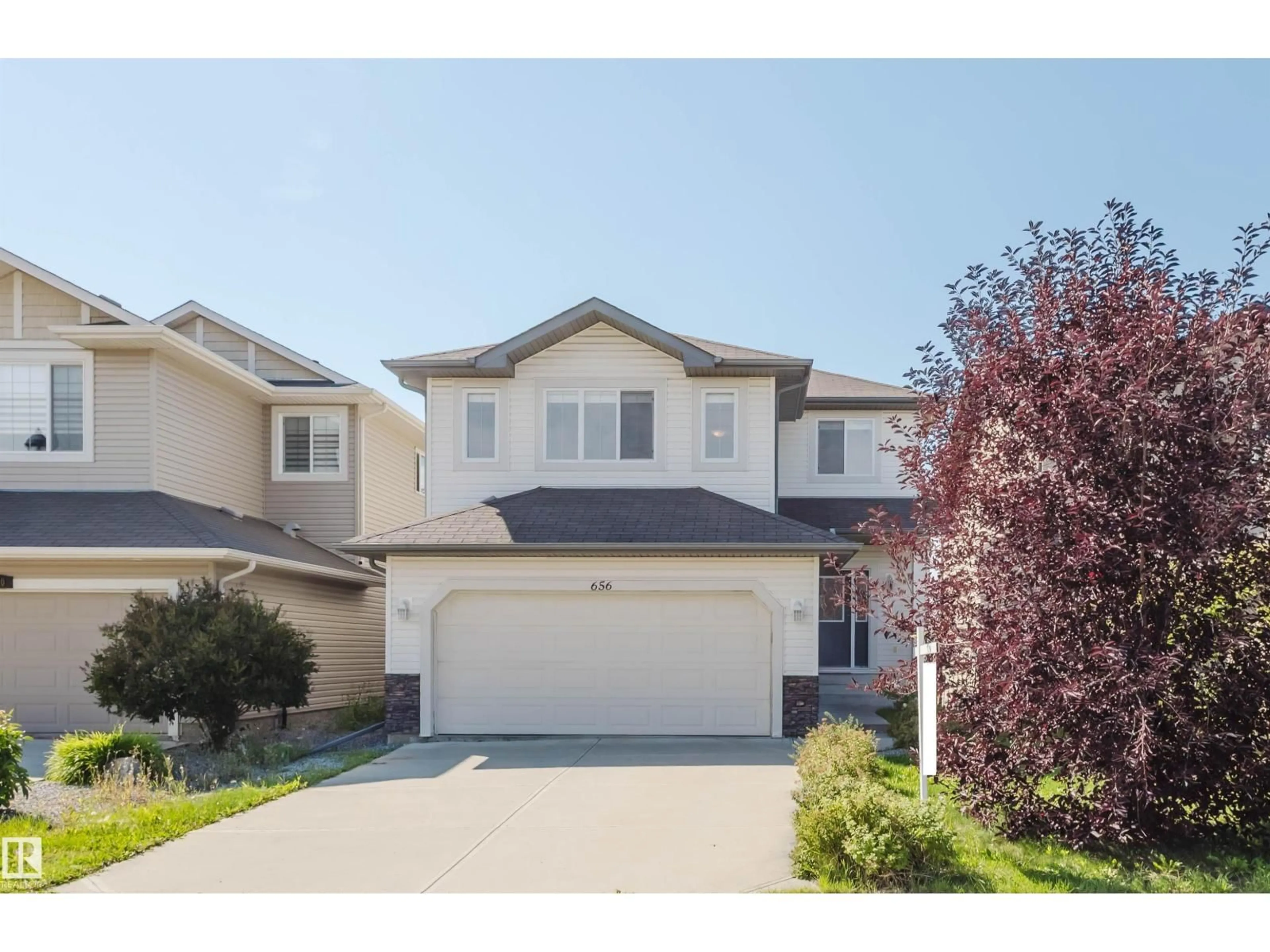 Home with vinyl exterior material, street for 656 171 ST, Edmonton Alberta T6W0M1