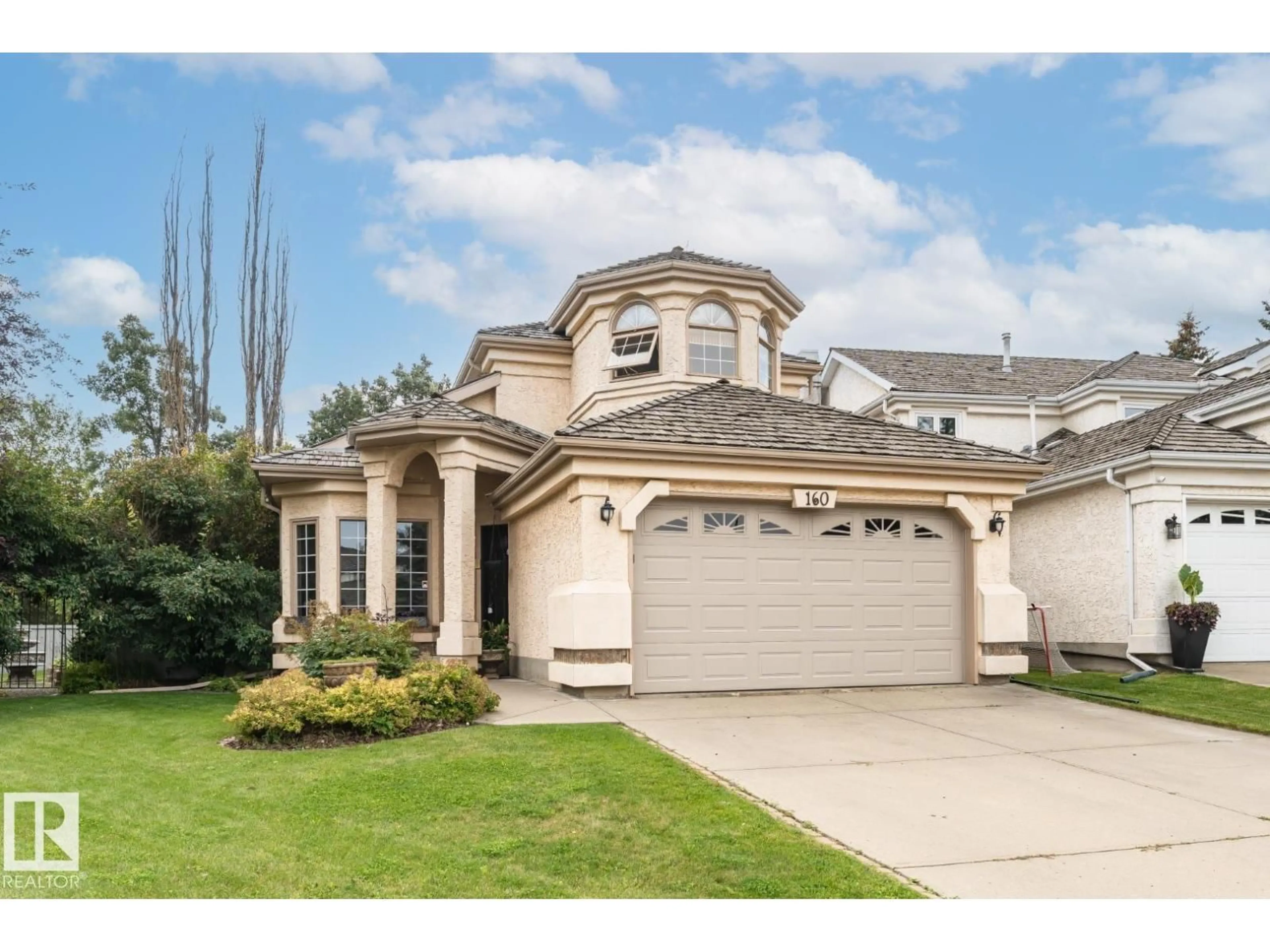 Home with vinyl exterior material, street for 160 CARLSON CL, Edmonton Alberta T6R2J7