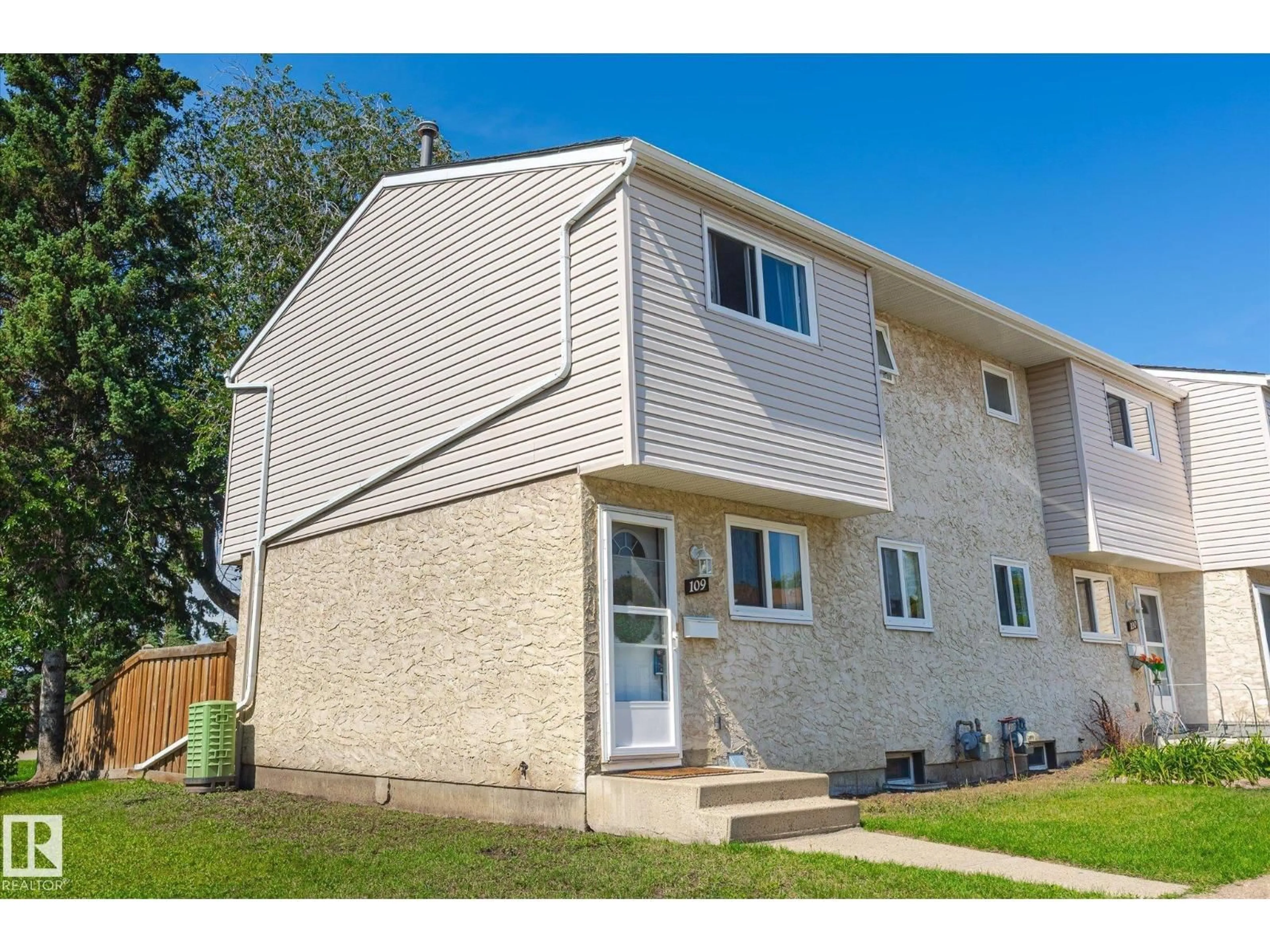 Home with vinyl exterior material, street for #109 - 5231 51 ST, Bon Accord Alberta T0A0K0