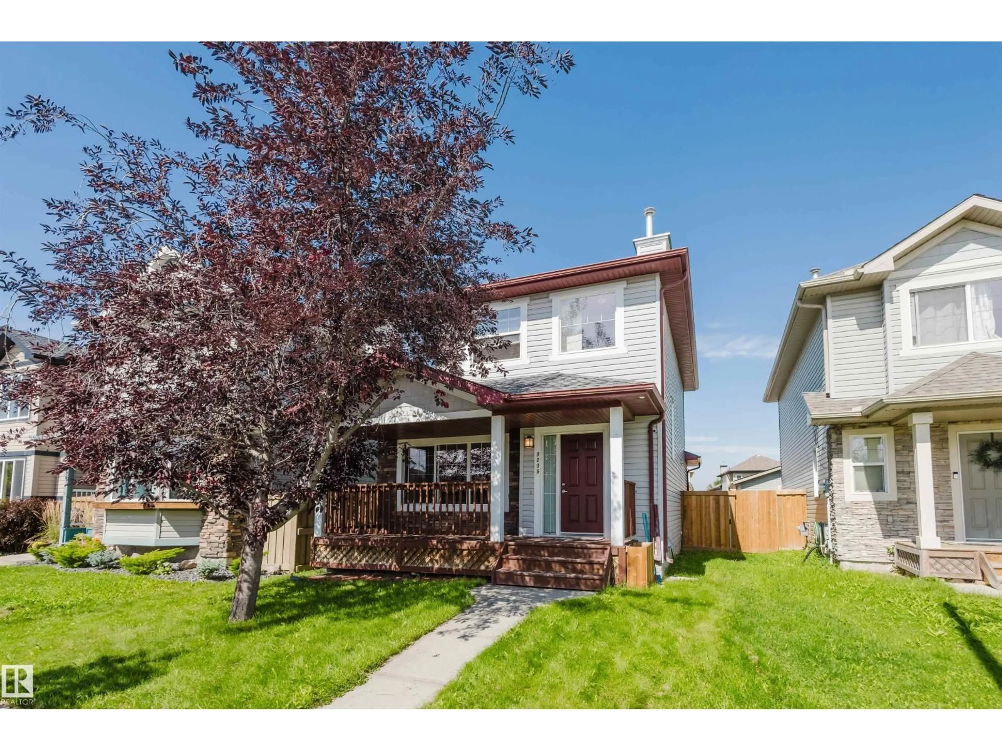 Home with vinyl exterior material, street for 9235 SCOTT LN, Edmonton Alberta T6R0E6