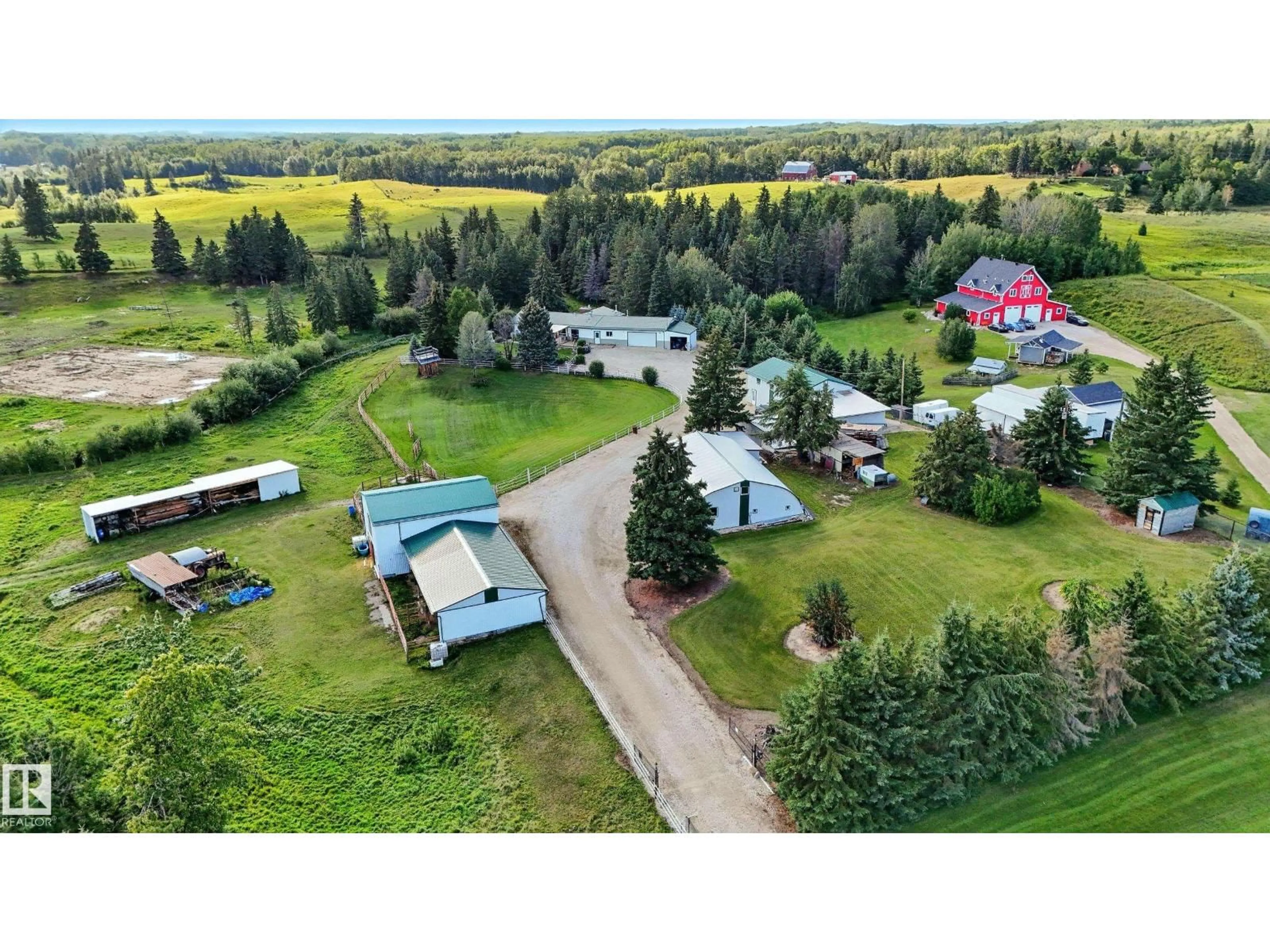 A pic from outside/outdoor area/front of a property/back of a property/a pic from drone, mountain view for 53110 RGE ROAD 12, Rural Parkland County Alberta T7Y2T1