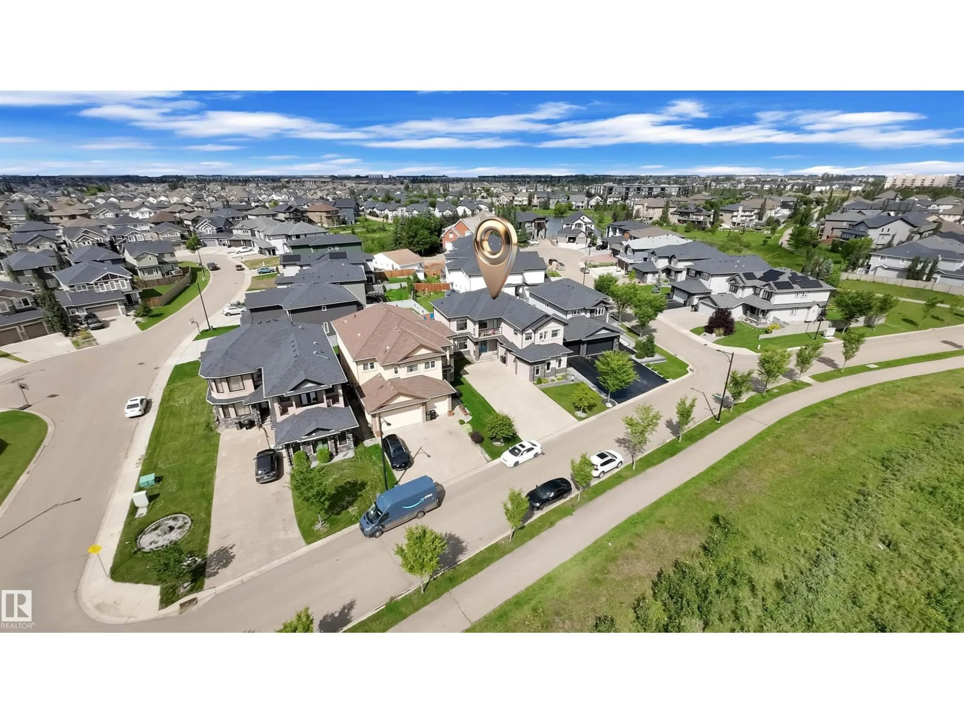 A pic from outside/outdoor area/front of a property/back of a property/a pic from drone, street for 1273 ADAMSON DR, Edmonton Alberta T6W2N7
