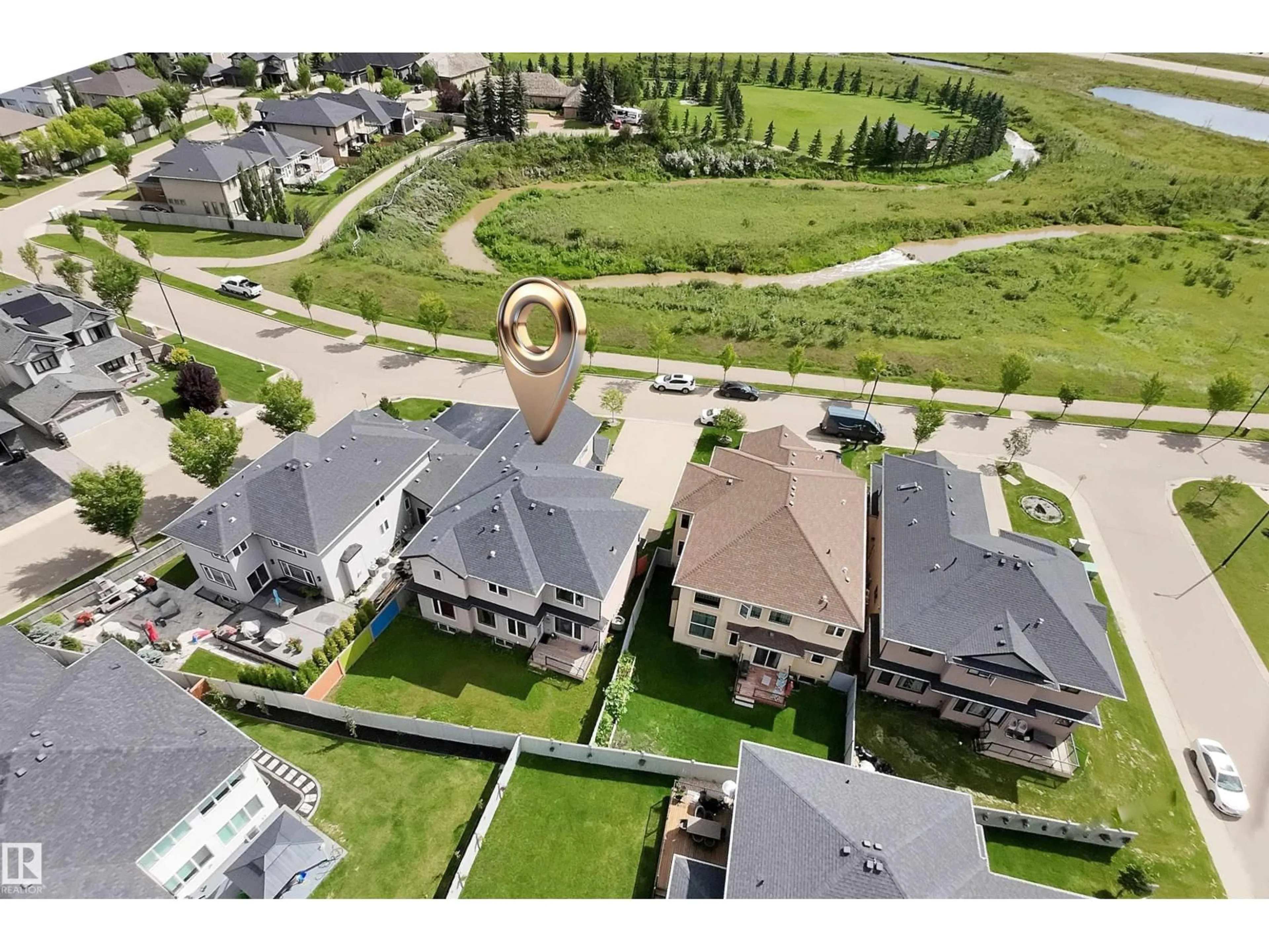 A pic from outside/outdoor area/front of a property/back of a property/a pic from drone, street for 1273 ADAMSON DR, Edmonton Alberta T6W2N7