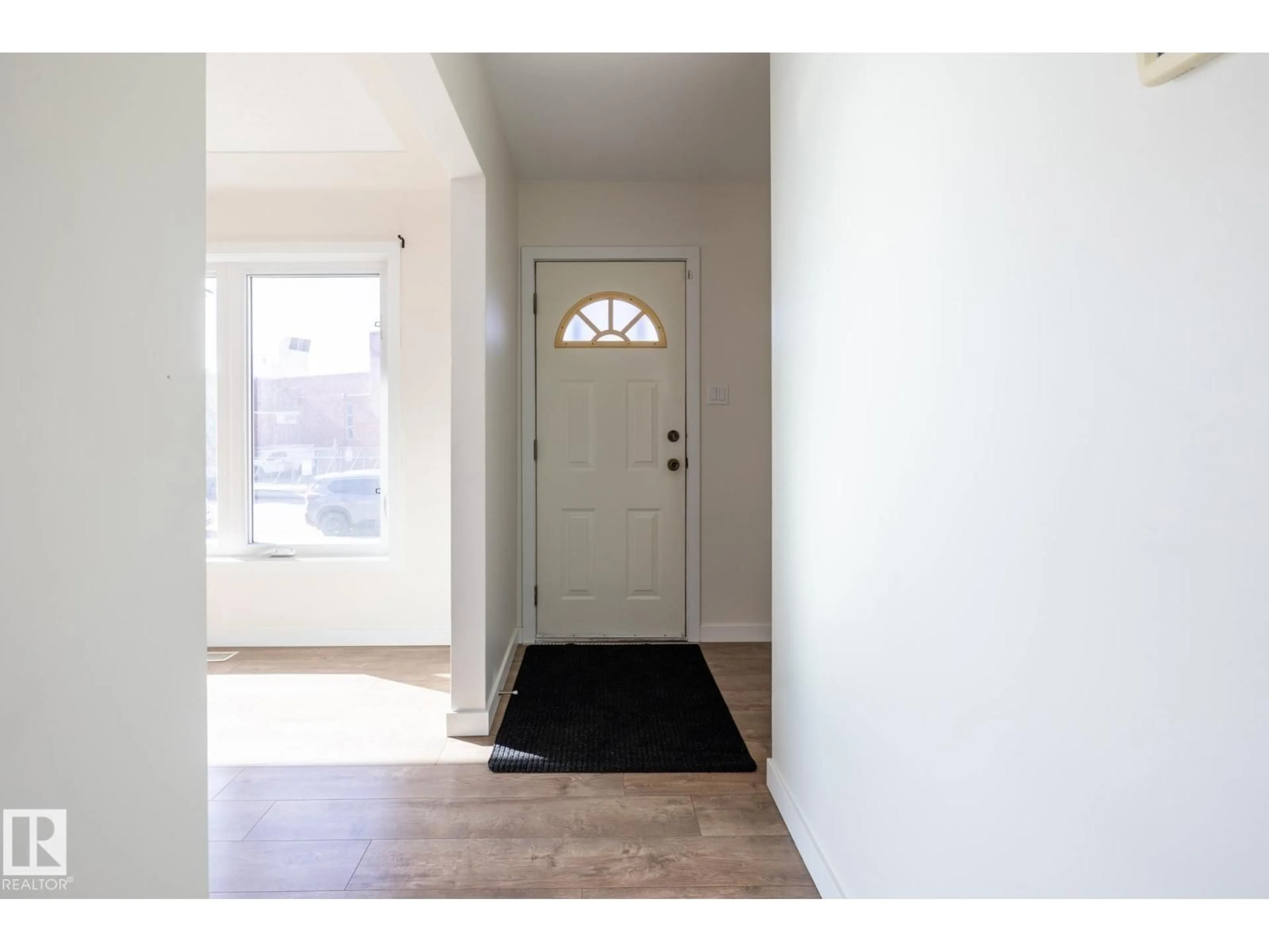 Indoor entryway for 13236 115 AV, Edmonton Alberta T5M3A6