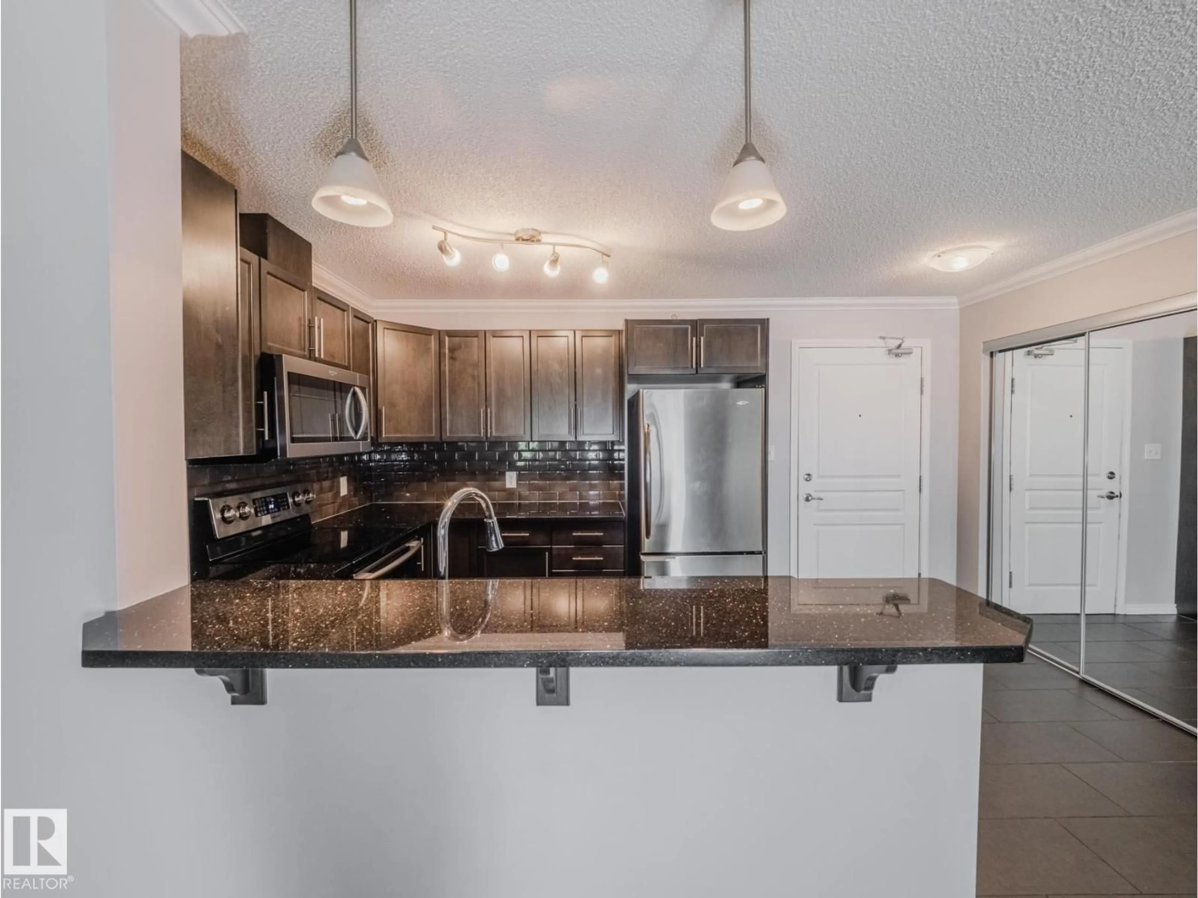 Open concept kitchen, unknown for #434 - 2436 GUARDIAN RD, Edmonton Alberta T5T2P5