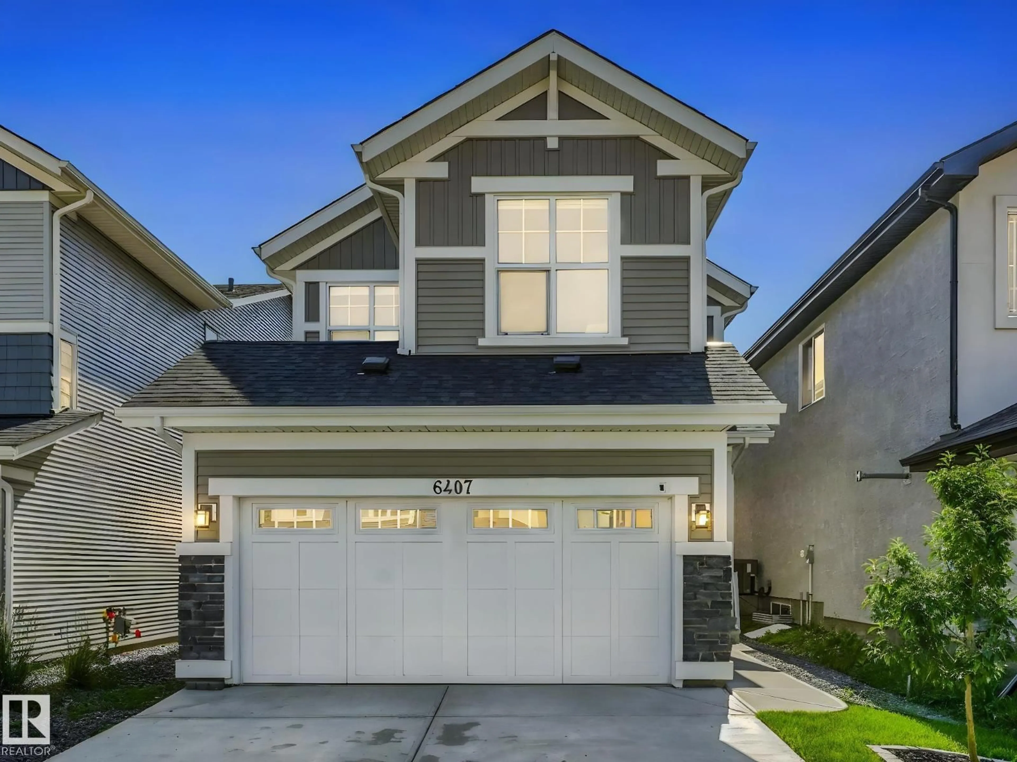 Home with vinyl exterior material, street for NW - 6407 174 AV, Edmonton Alberta T5Y3T6
