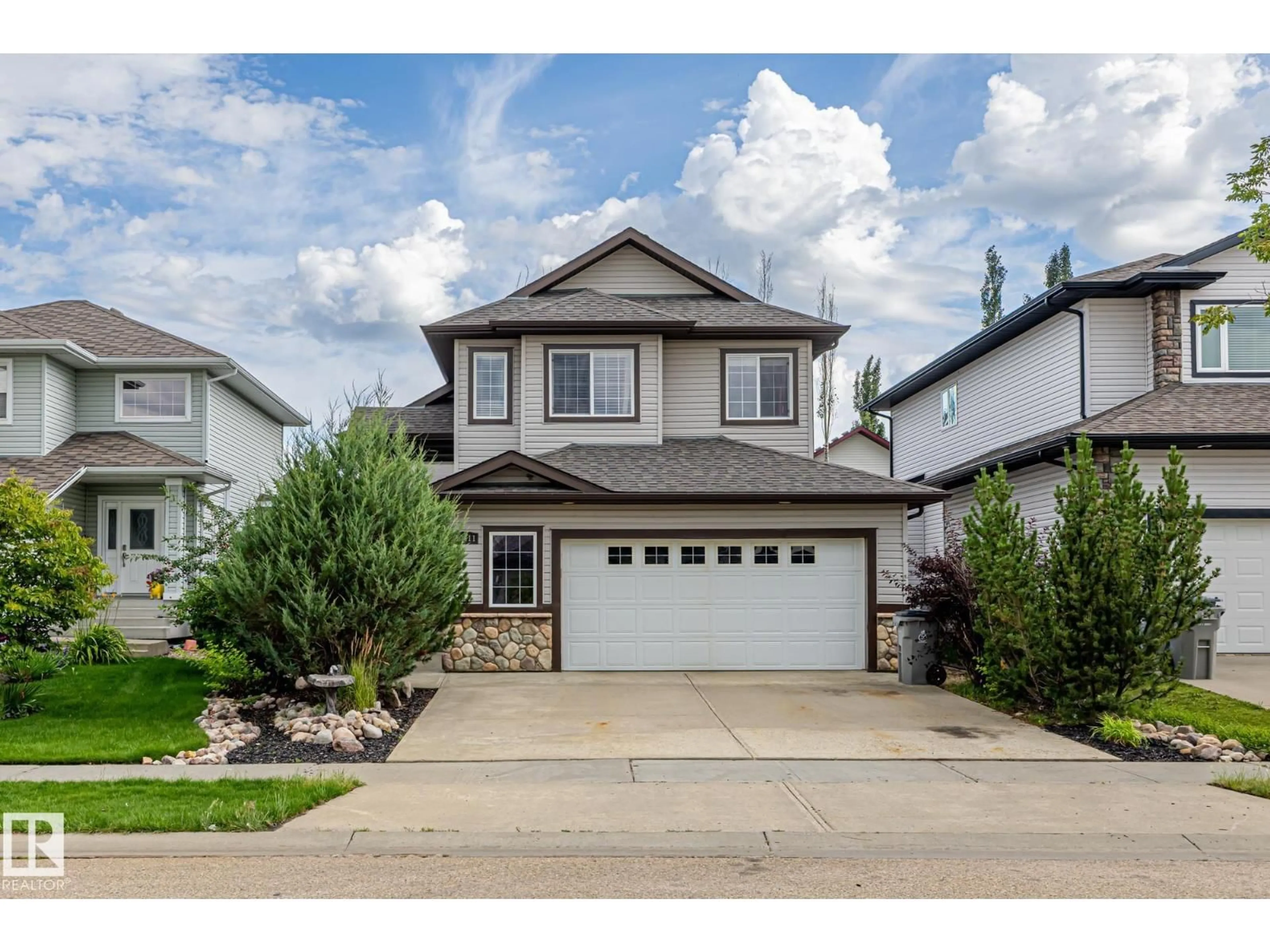 Home with vinyl exterior material, street for 10411 95 ST, Morinville Alberta T8R0A2