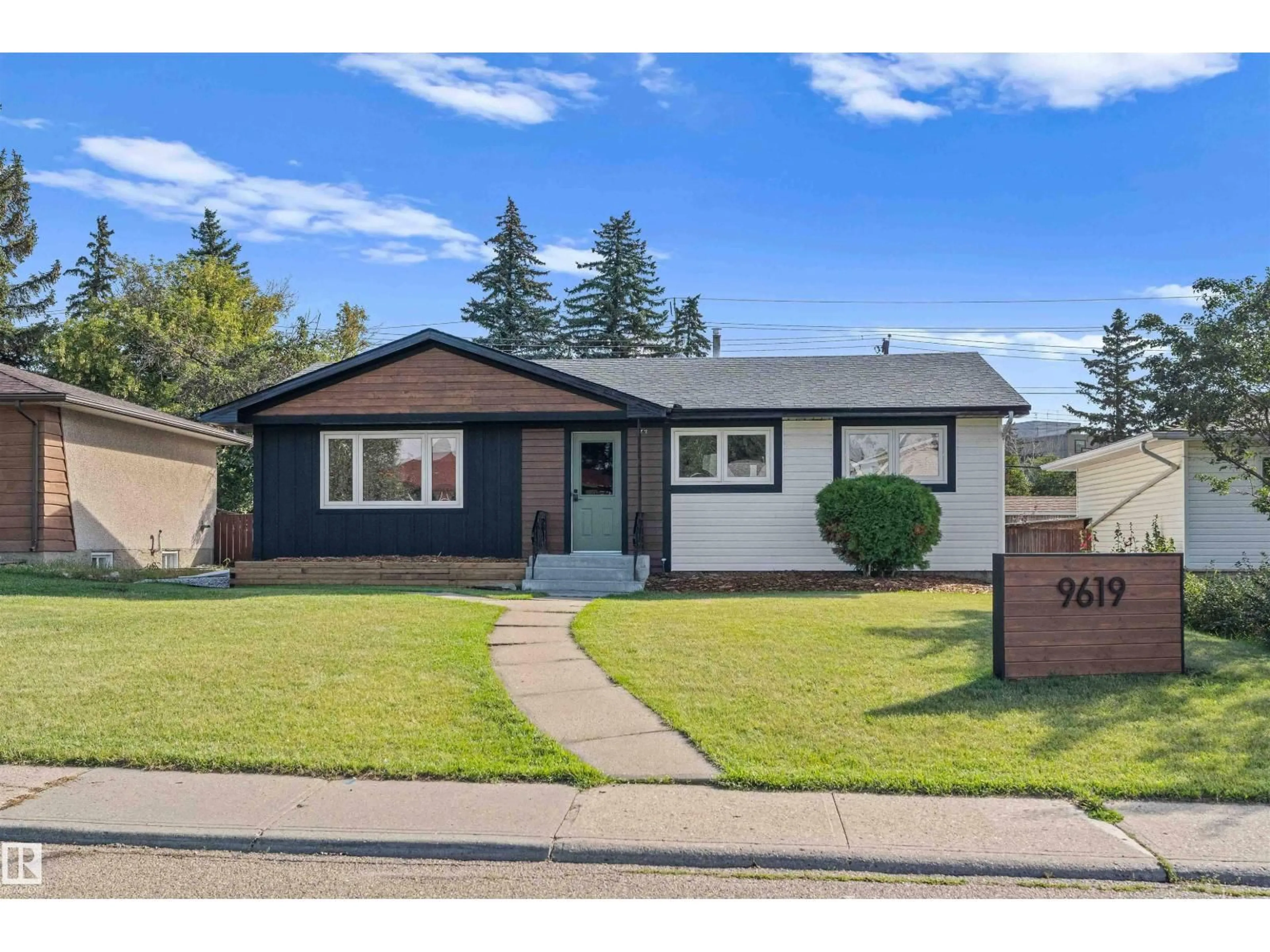 Home with vinyl exterior material, street for 9619 52 ST, Edmonton Alberta T6B1G8