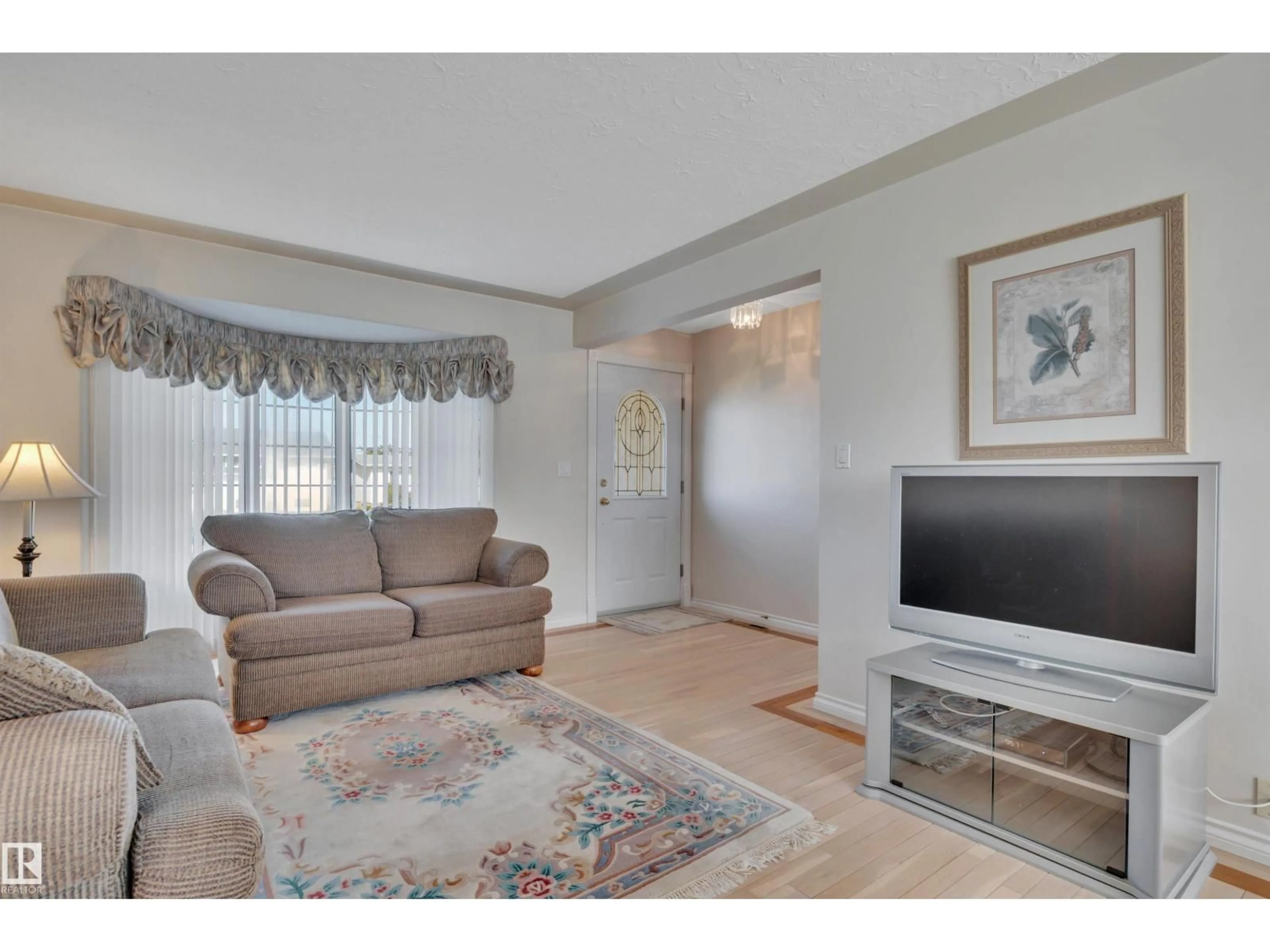 Living room with furniture, unknown for 13235 94 ST, Edmonton Alberta T5E3V7
