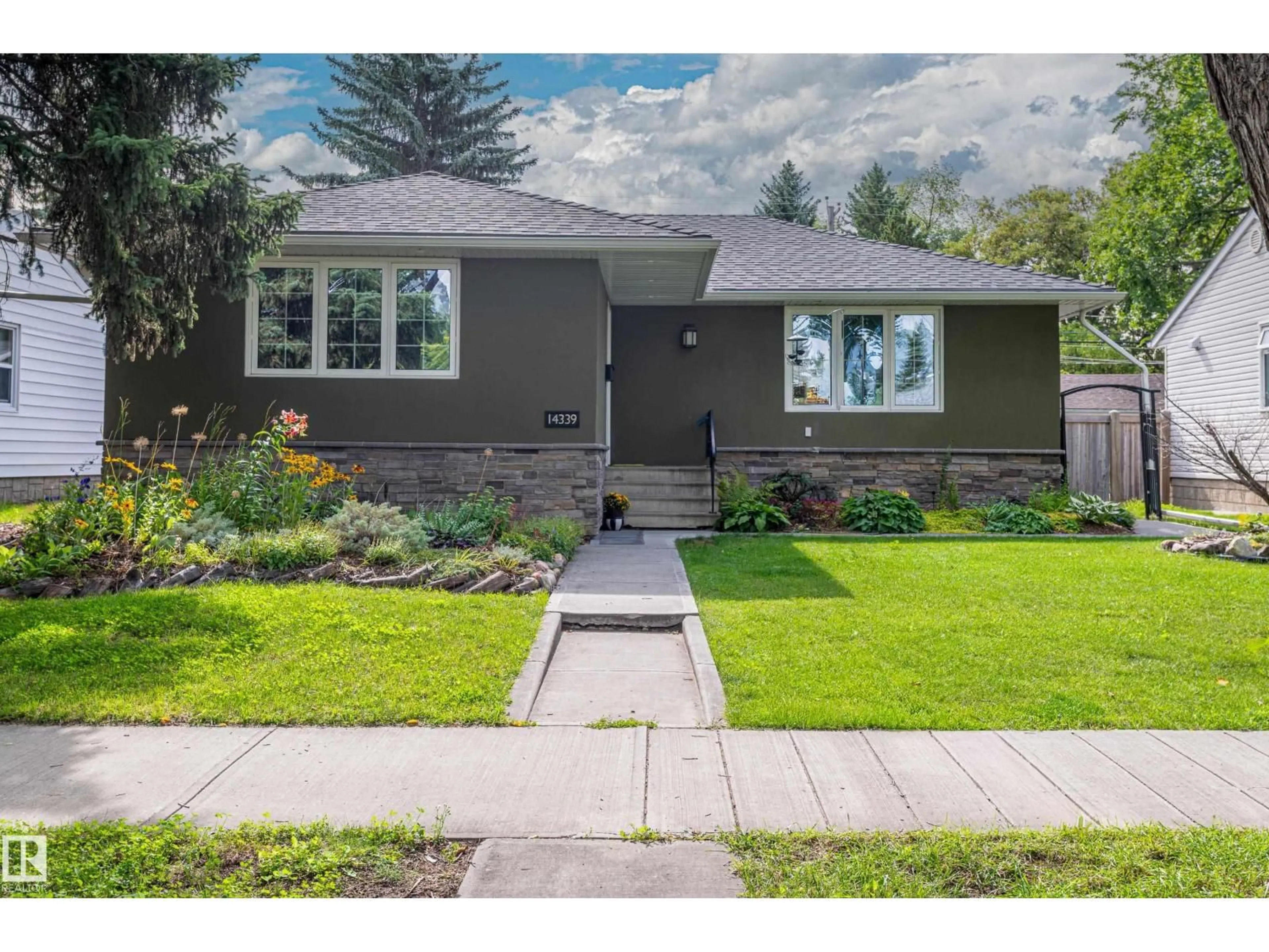 Home with vinyl exterior material, street for 14339 92A AV AV, Edmonton Alberta T5R5E3