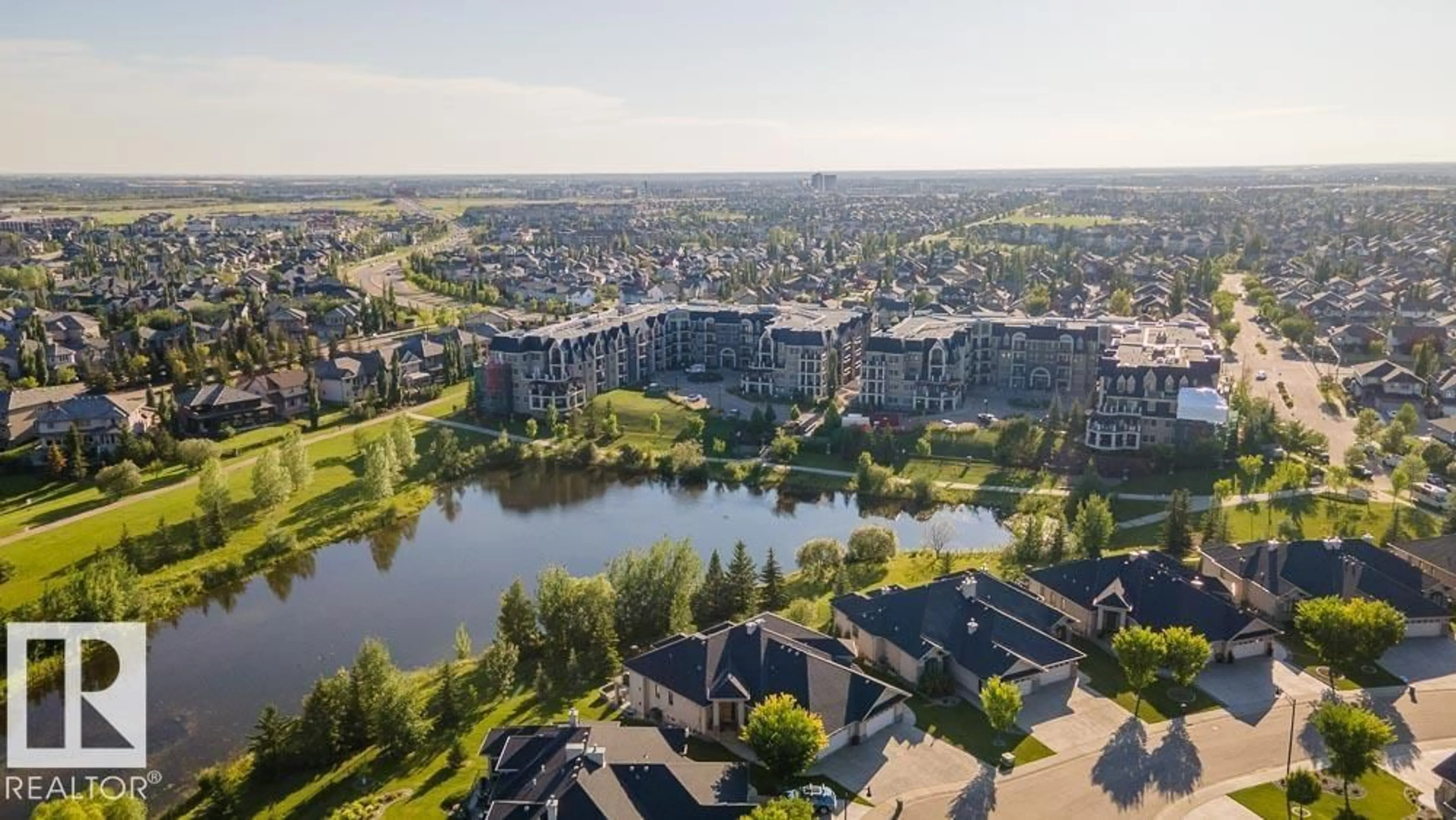 A pic from outside/outdoor area/front of a property/back of a property/a pic from drone, water/lake/river/ocean view for 6079 - 446 MAYNARD WY, Edmonton Alberta T6R0S4