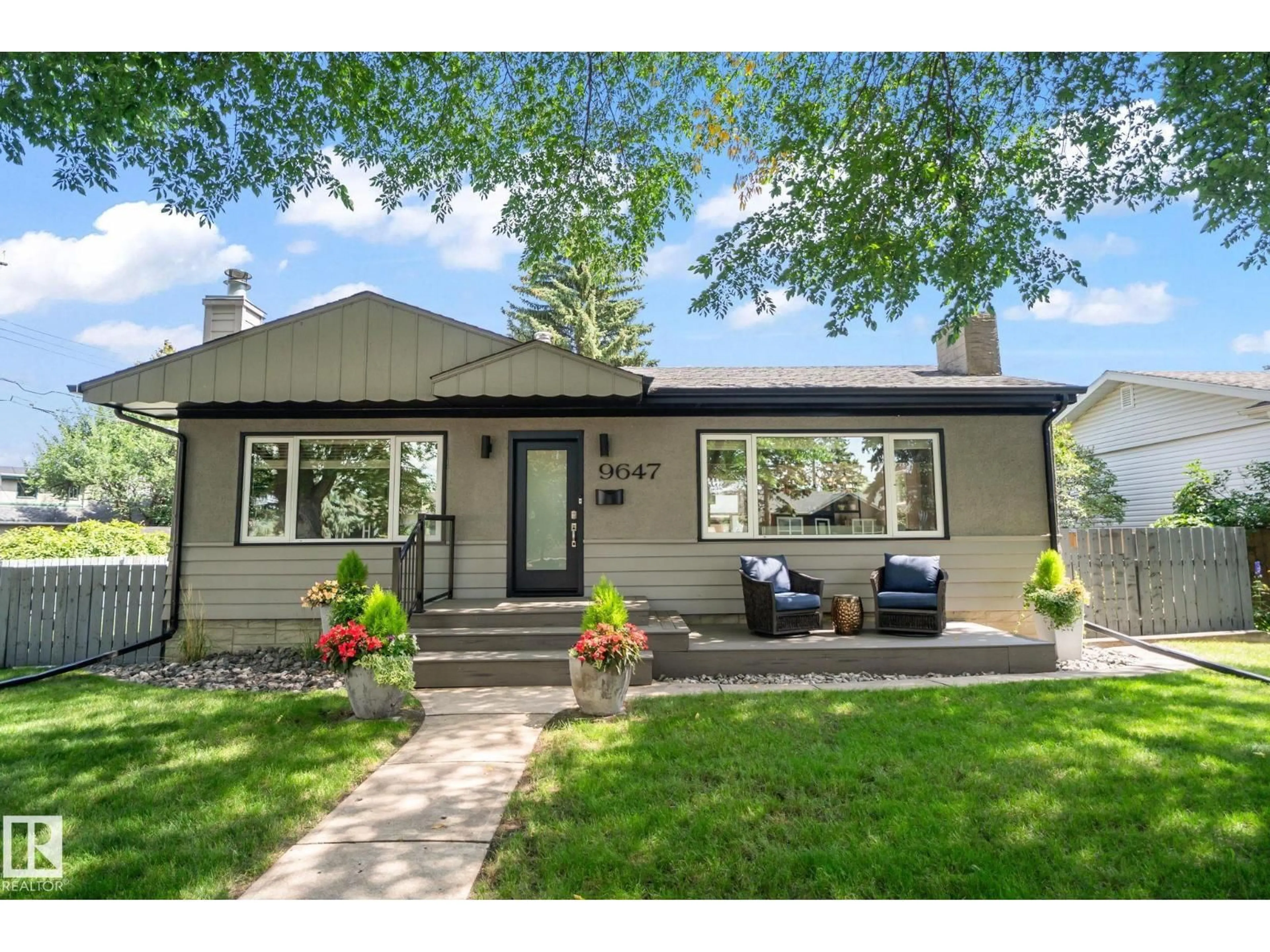 Home with vinyl exterior material, street for 9647 86 ST, Edmonton Alberta T6C3E8