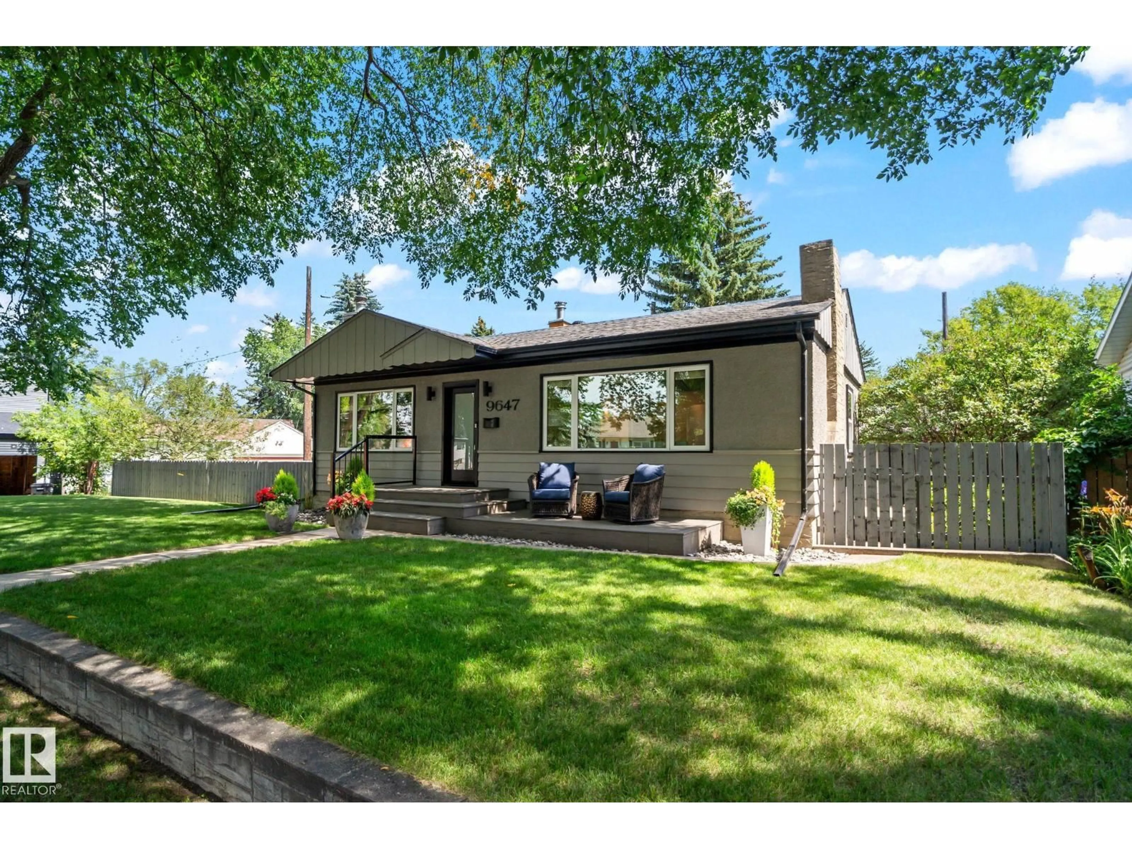 Home with vinyl exterior material, street for 9647 86 ST, Edmonton Alberta T6C3E8