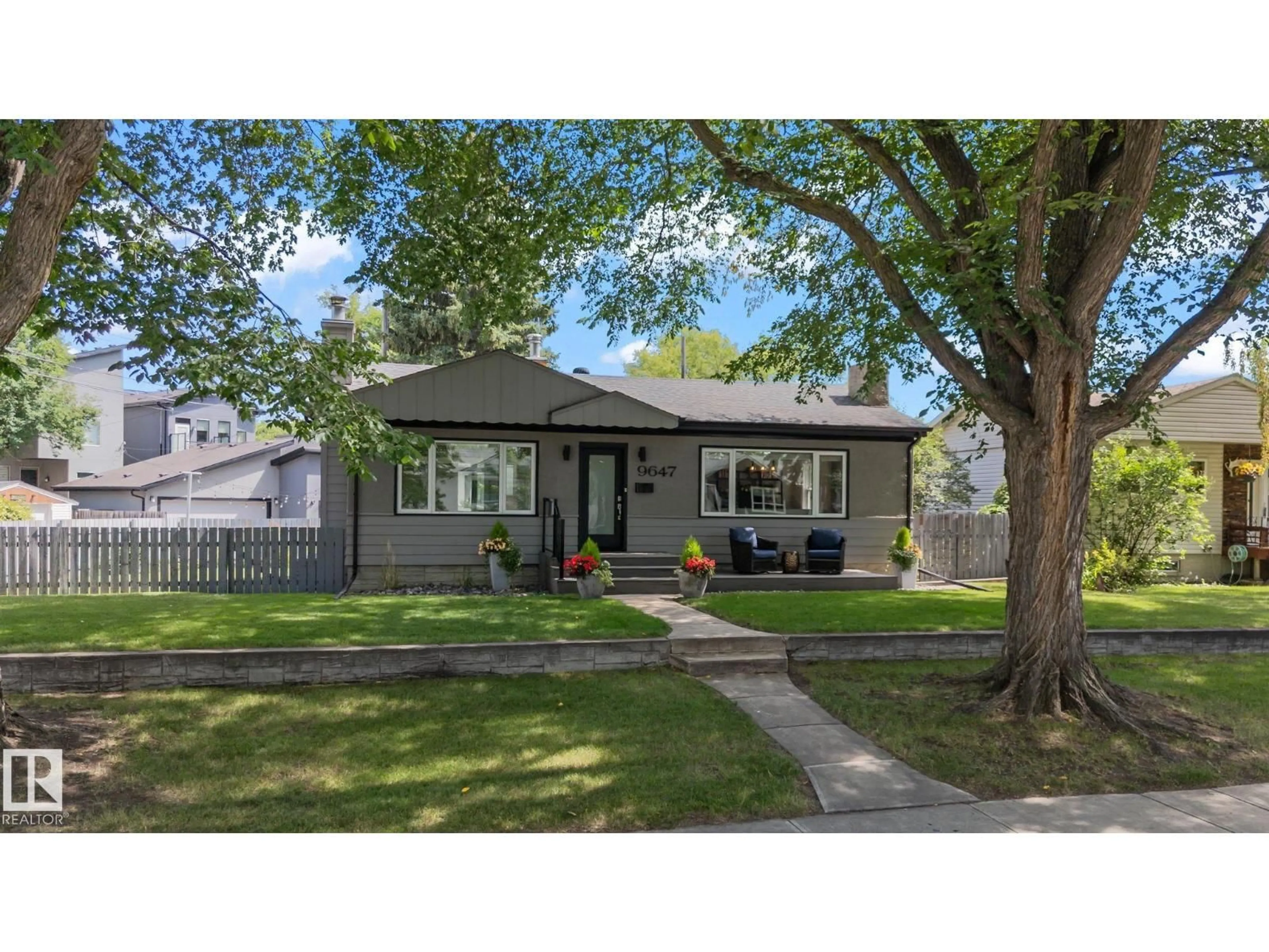 Home with vinyl exterior material, street for 9647 86 ST, Edmonton Alberta T6C3E8