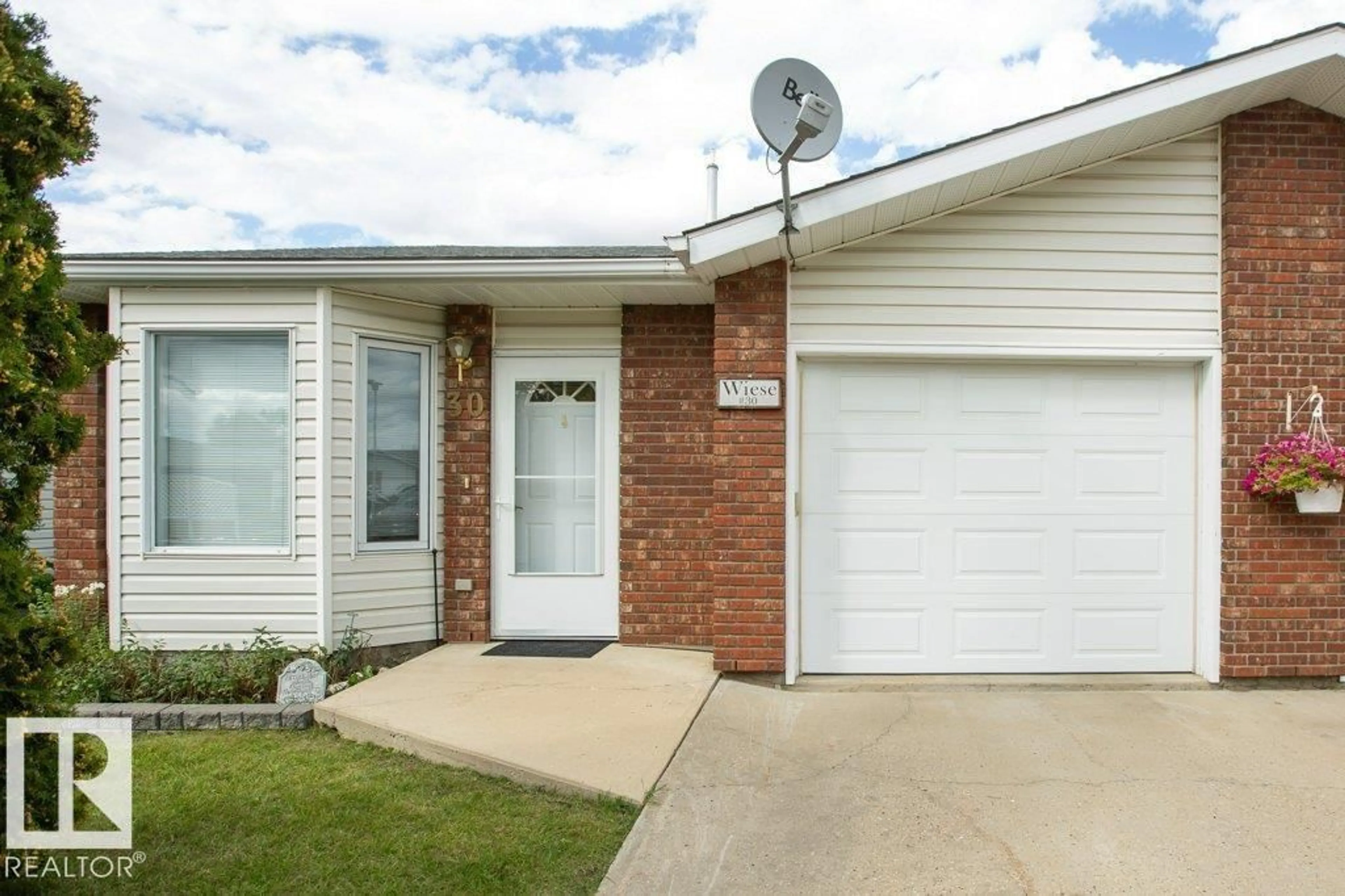 Home with brick exterior material, street for #30 - 11015 105 AV, Westlock Alberta T7P1A1