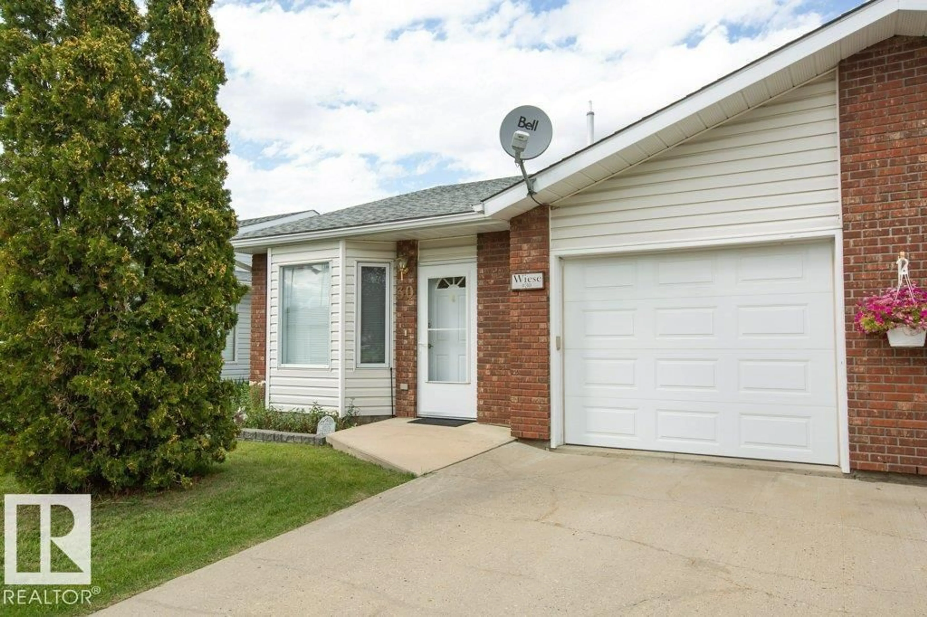 Home with brick exterior material, street for #30 - 11015 105 AV, Westlock Alberta T7P1A1