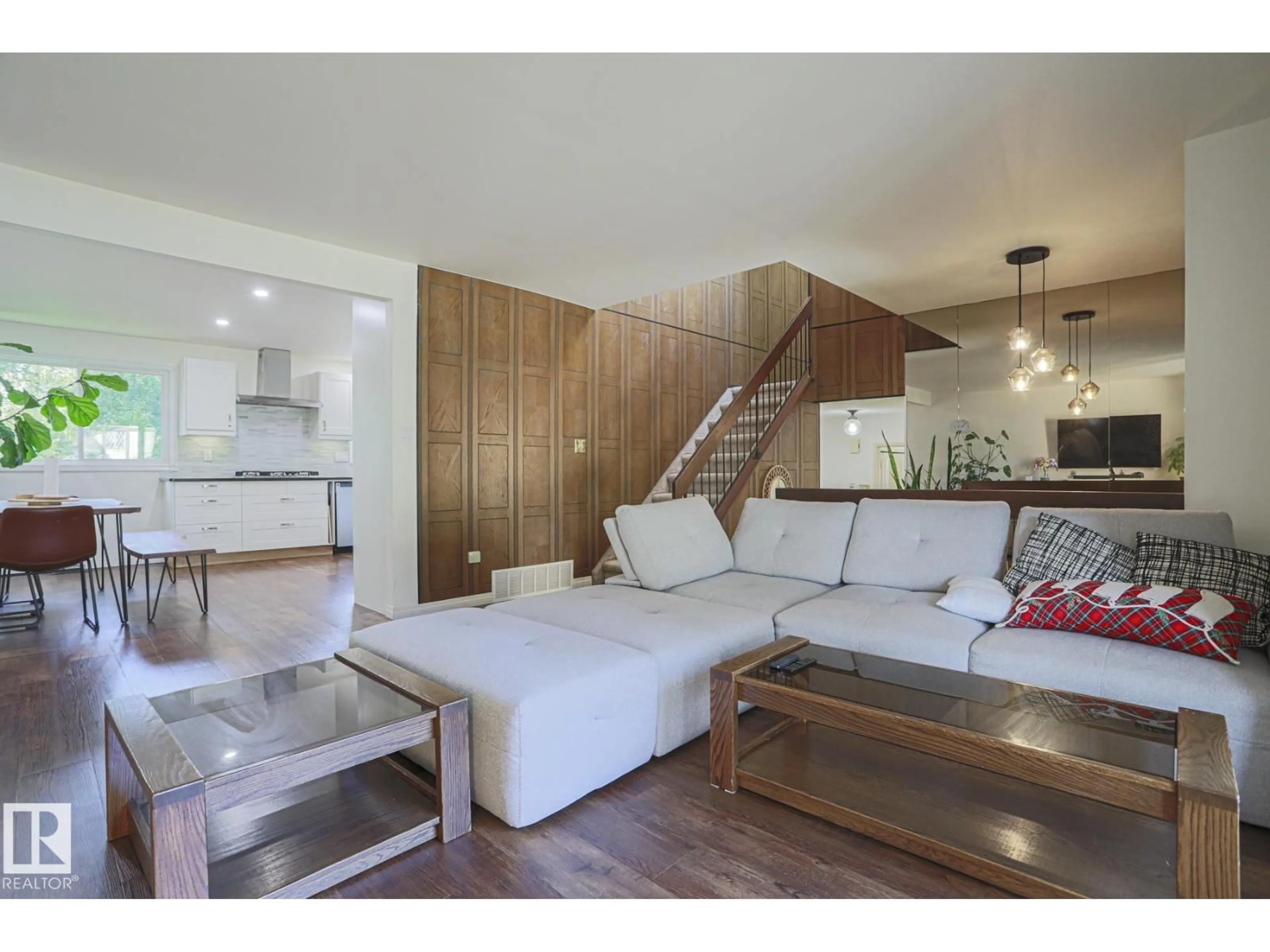 Living room with furniture, wood/laminate floor for NW - 7608 181 ST, Edmonton Alberta T5T1Z7