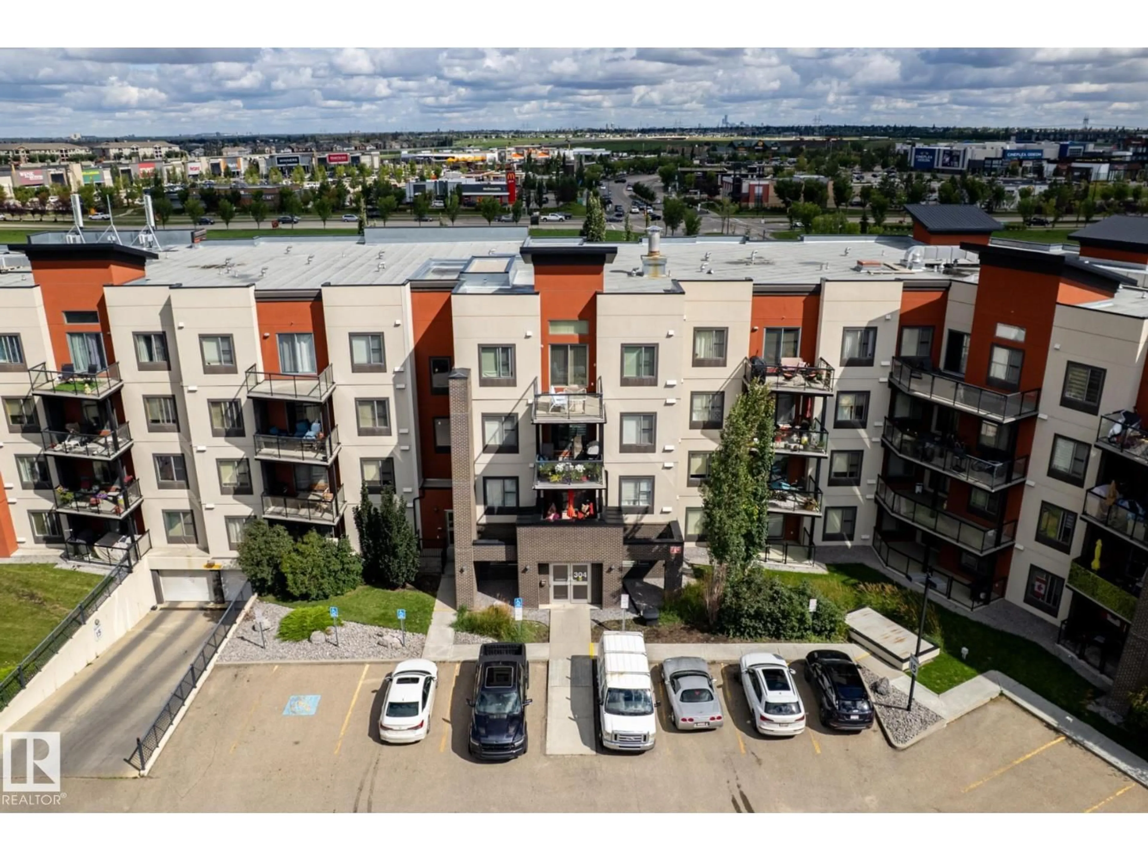 A pic from outside/outdoor area/front of a property/back of a property/a pic from drone, city buildings view from balcony for 214 - 304 AMBLESIDE LINK LI, Edmonton Alberta T6W0V2