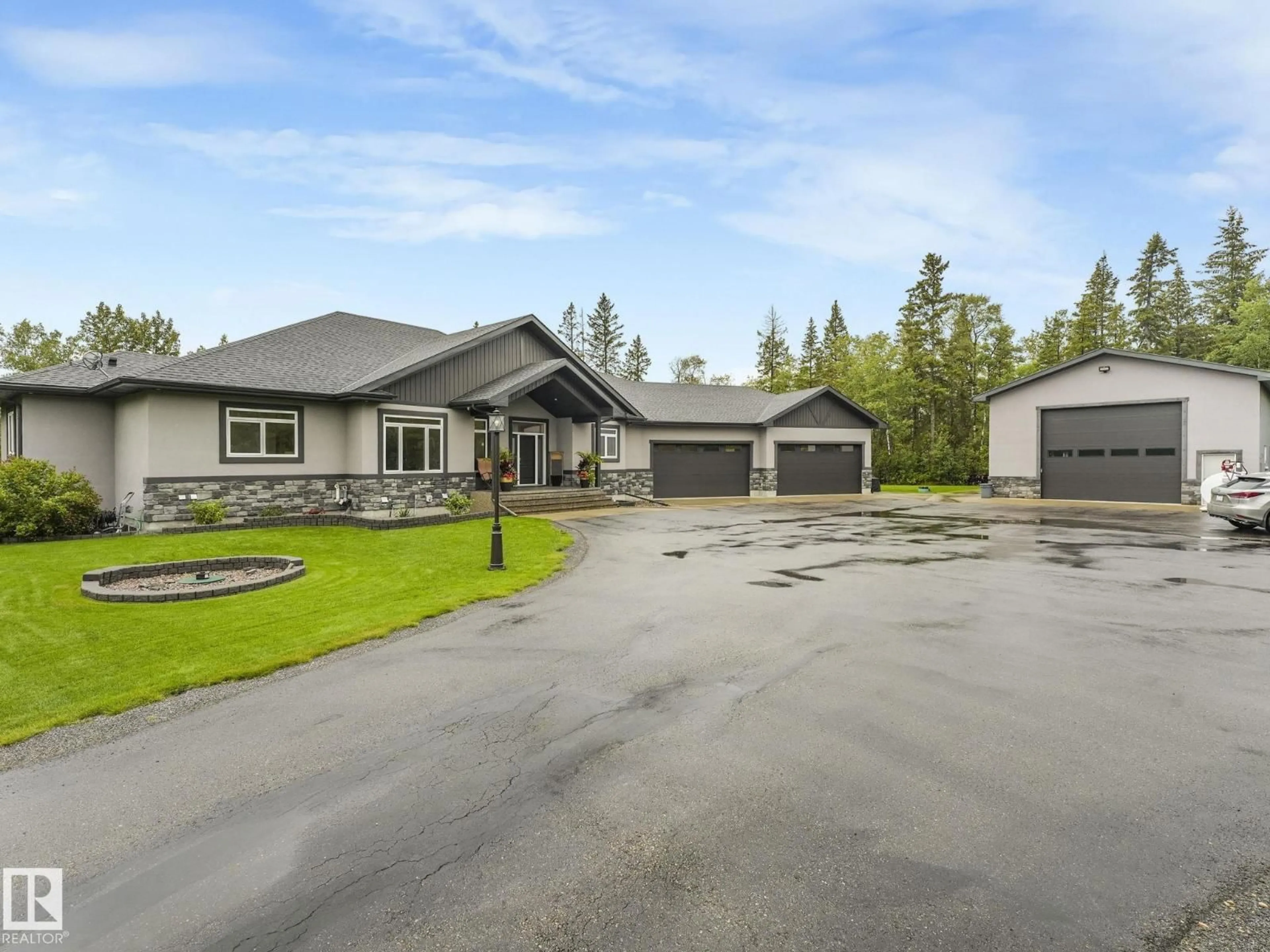 A pic from outside/outdoor area/front of a property/back of a property/a pic from drone, street for 1040 RGE ROAD 240 A, Rural Leduc County Alberta T4X0W1
